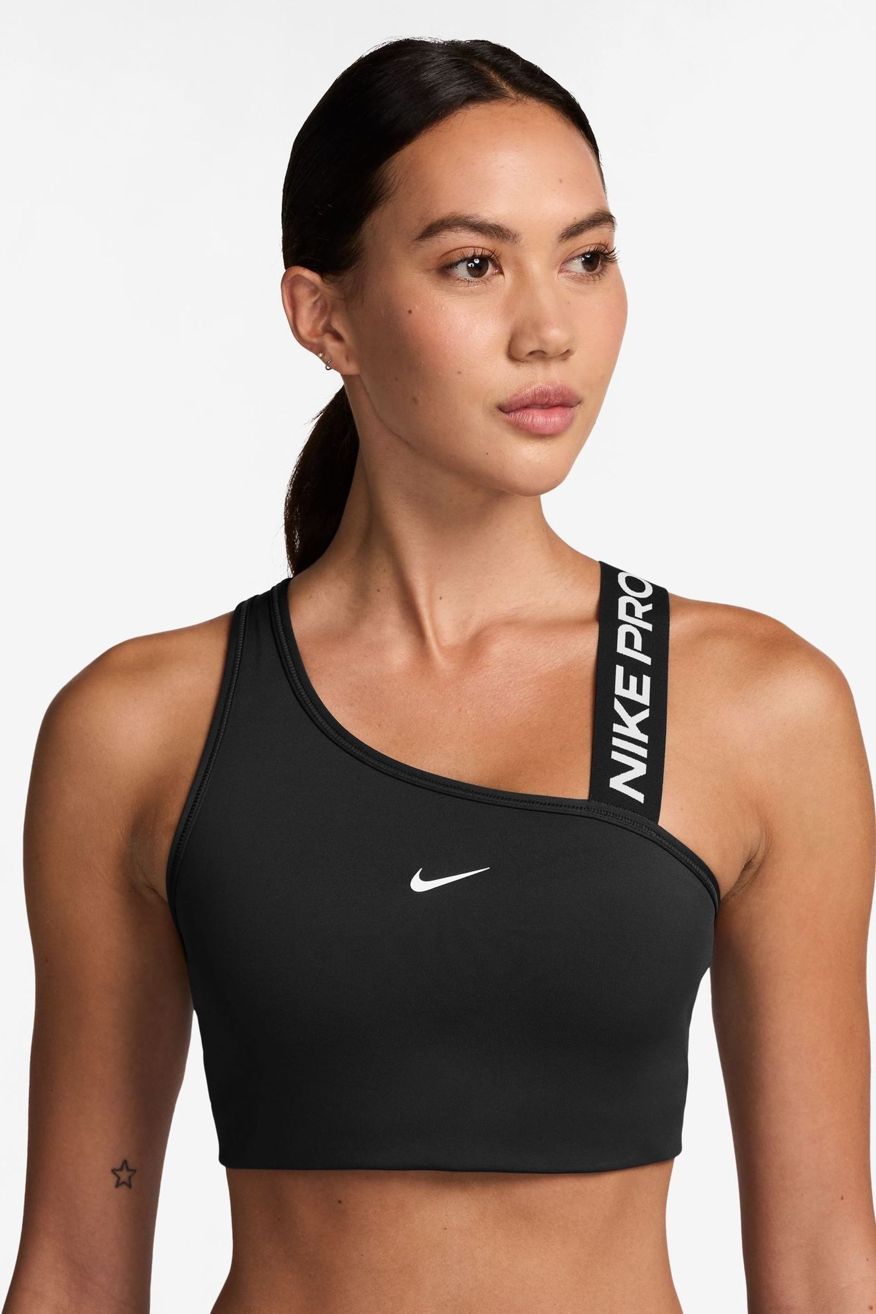 Buy Nike Black Pro Swoosh Asymmetrical Medium Support Padded Sports Bra from Next Luxembourg