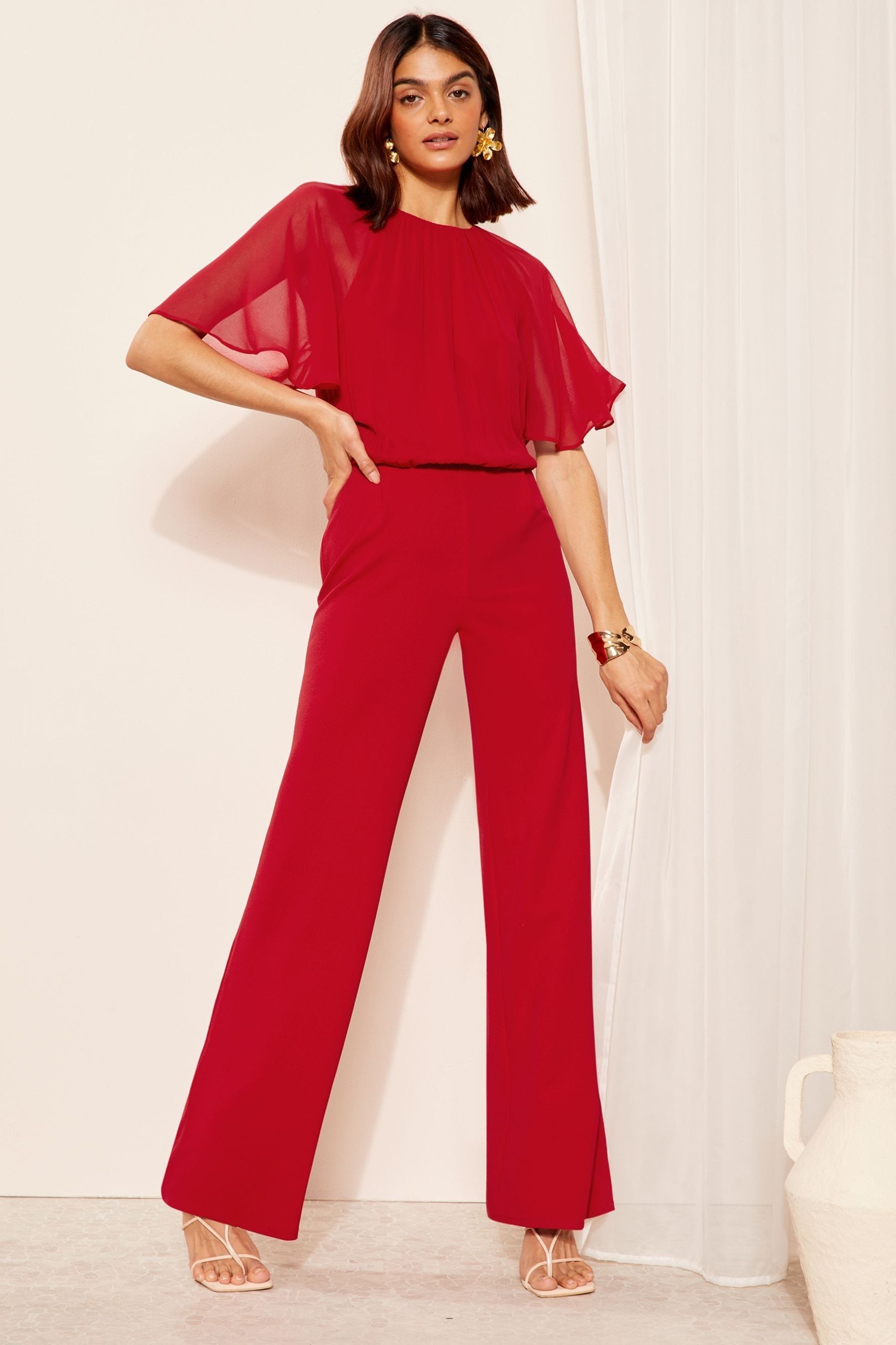 Buy Friends Like These Red Chiffon Flutter Sleeve Wide Leg Jumpsuit from the Next UK online shop