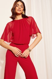 Friends Like These Red Chiffon Flutter Sleeve Wide Leg Jumpsuit - Image 4 of 4