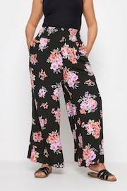 Yours Curve Black Floral Bloom Print Shirred Wide Leg Trousers - Image 1 of 5