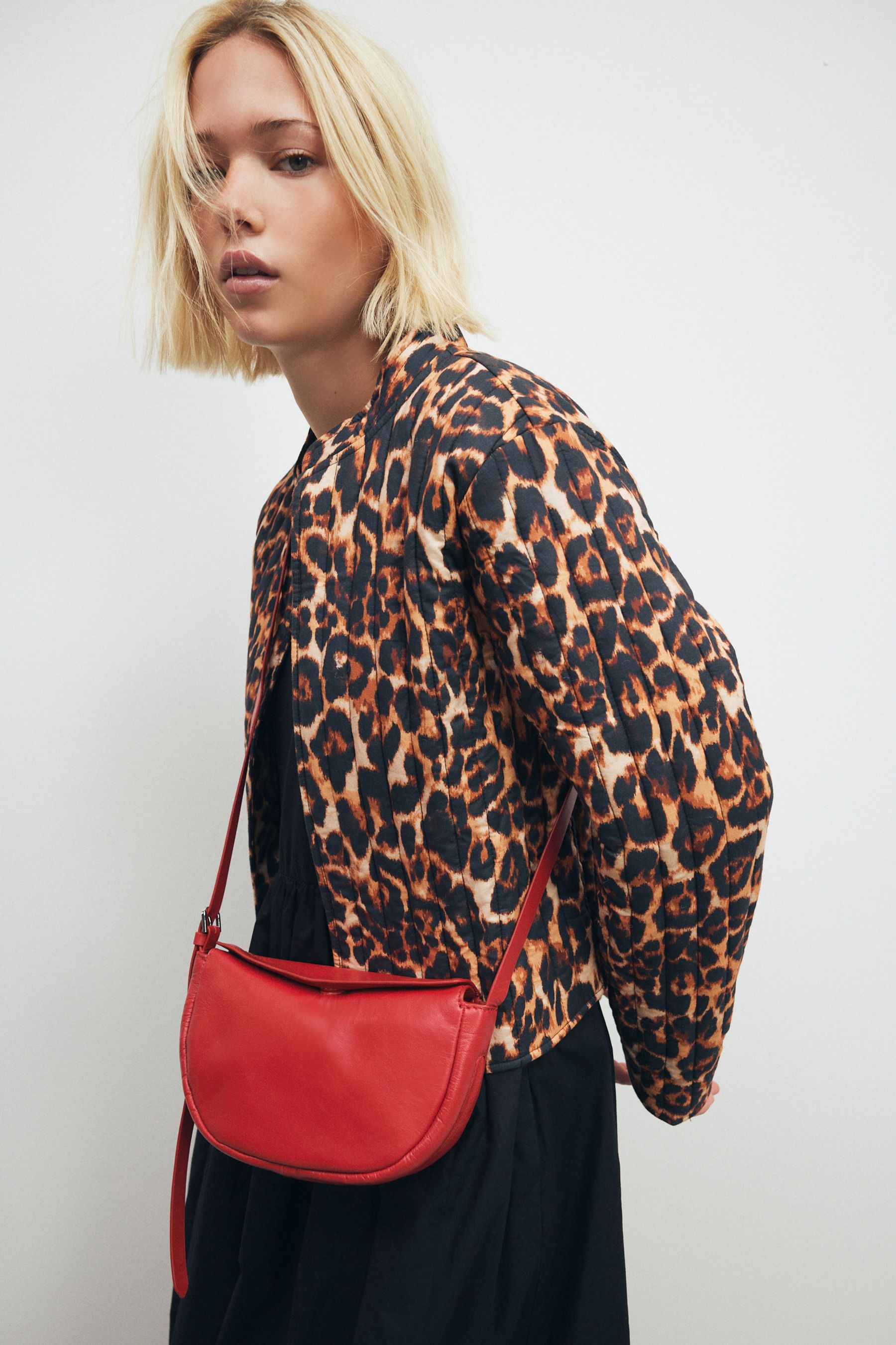 Red leather sling bag on sale