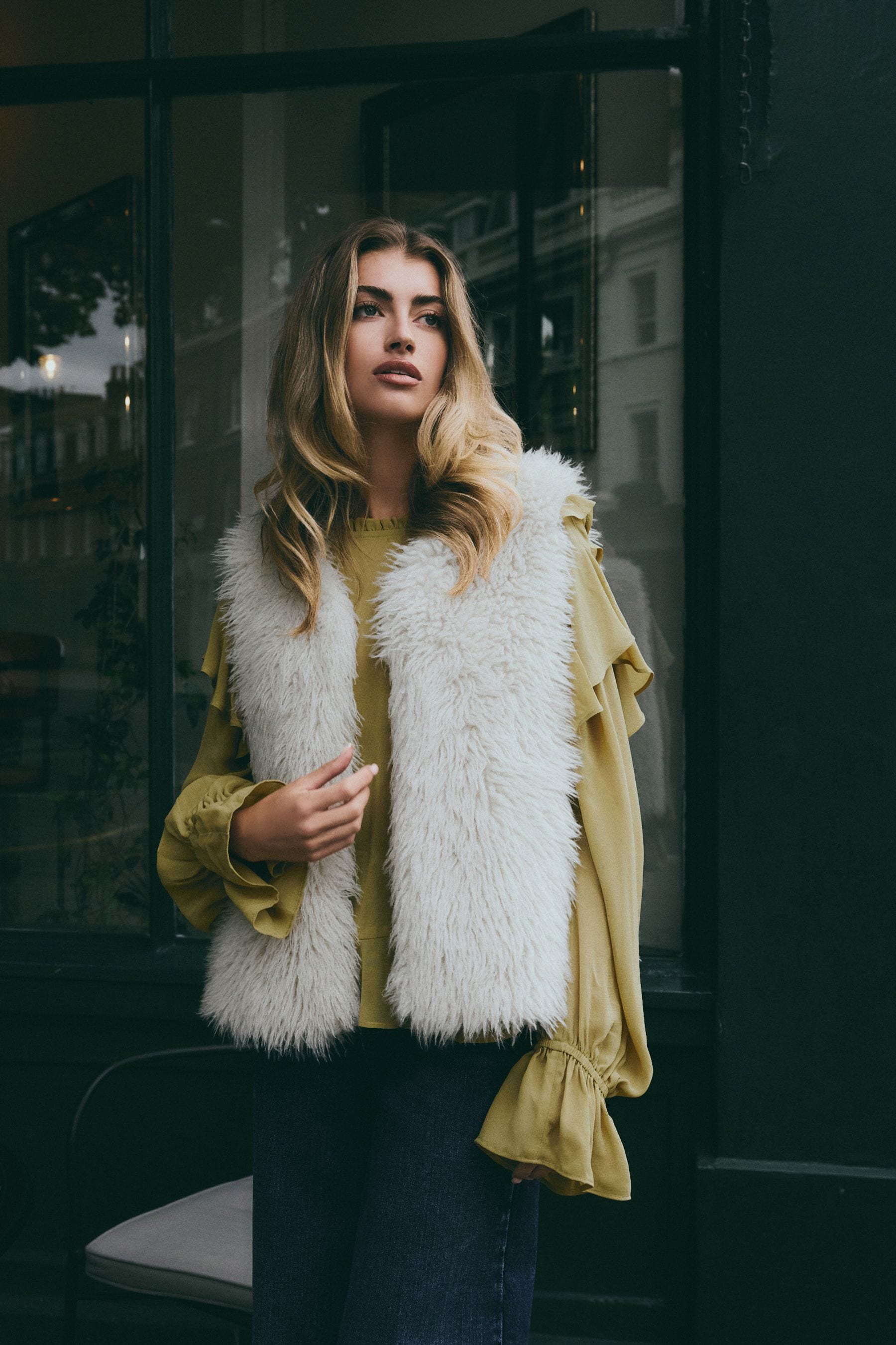 White fluffy gilet top