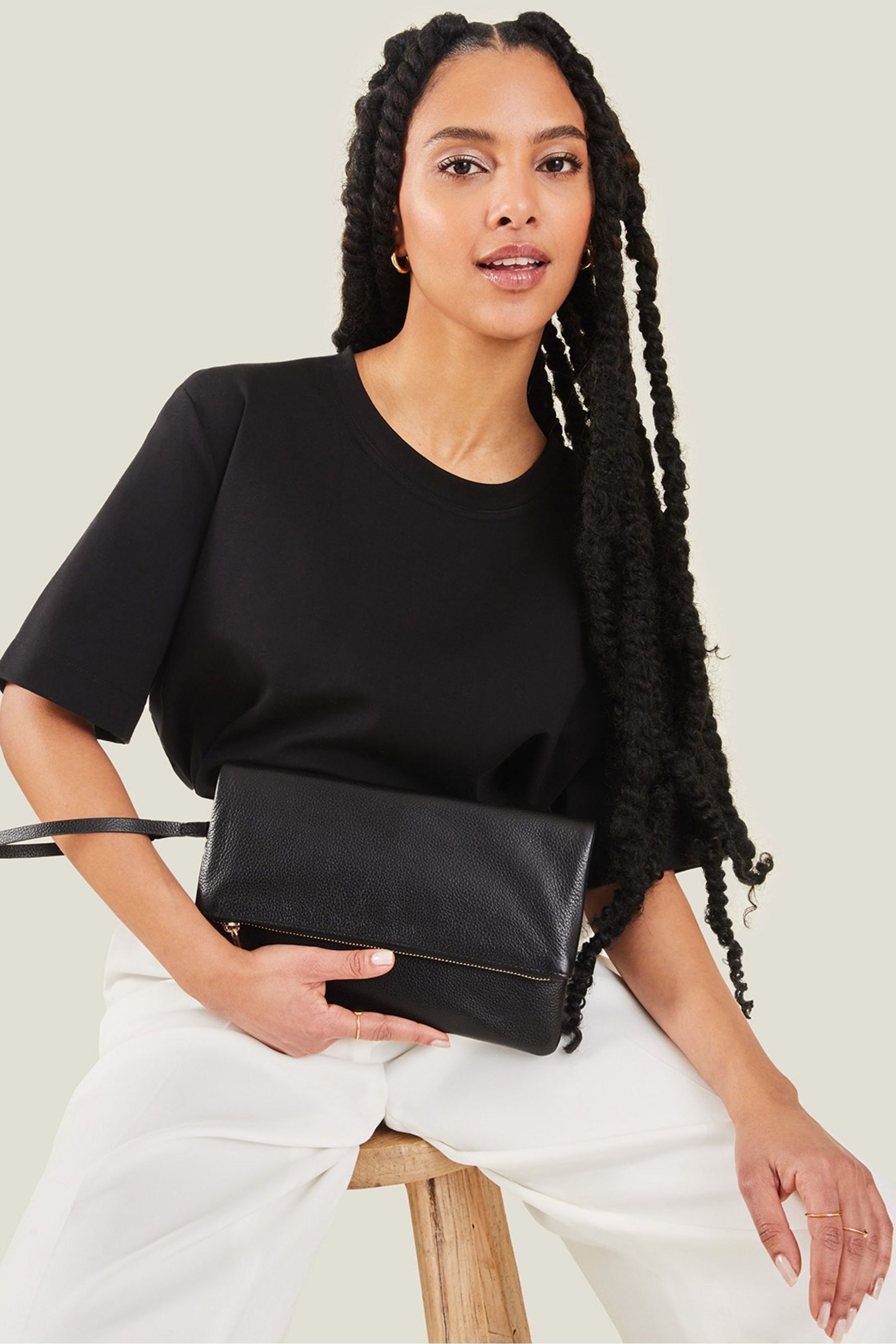Black leather clutch bag deals