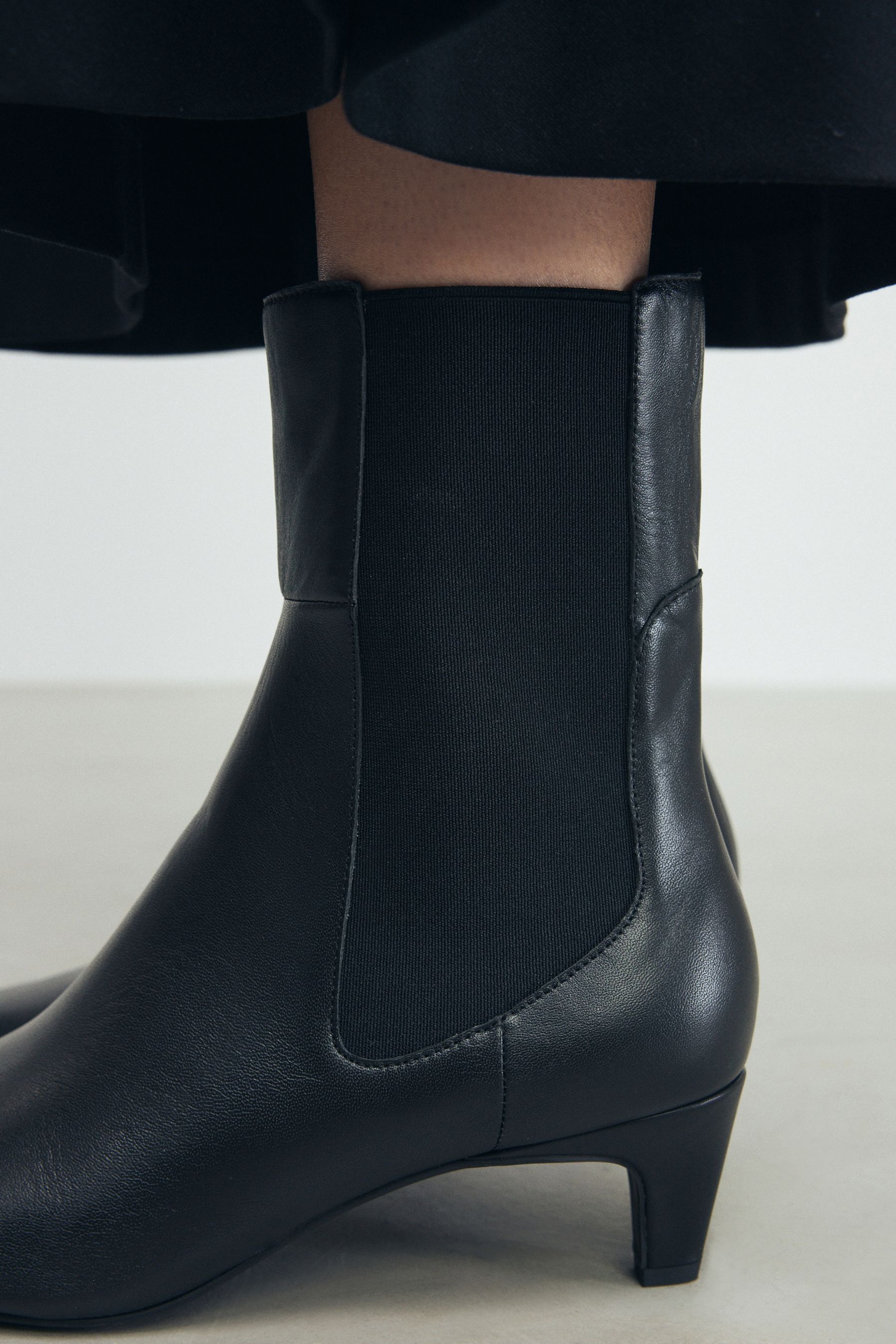Buy Black Leather Standard Wide Fit Forever Comfort Chisel Toe Chelsea Ankle Boots from the Next UK online shop