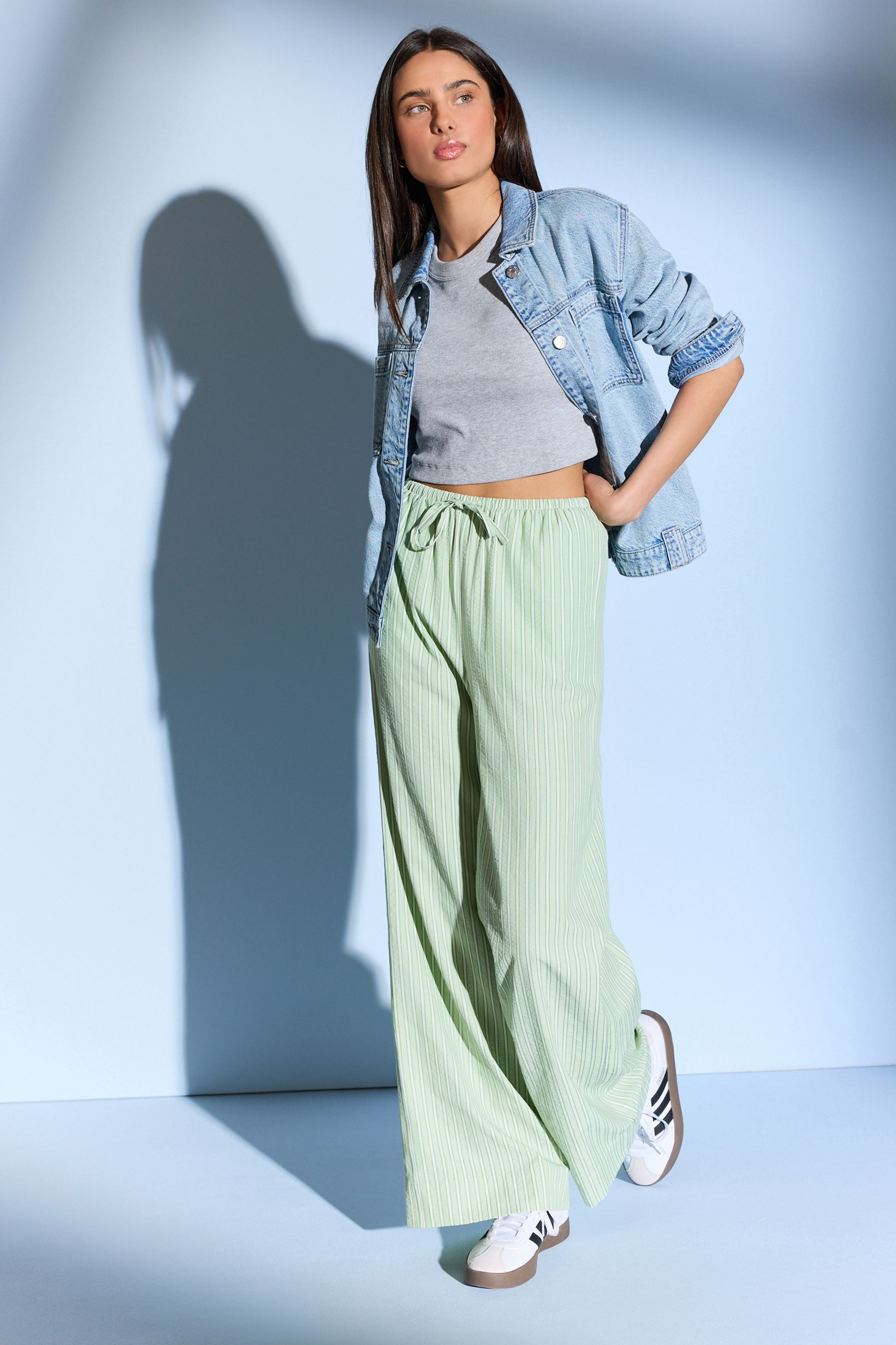 Green and black striped trousers store