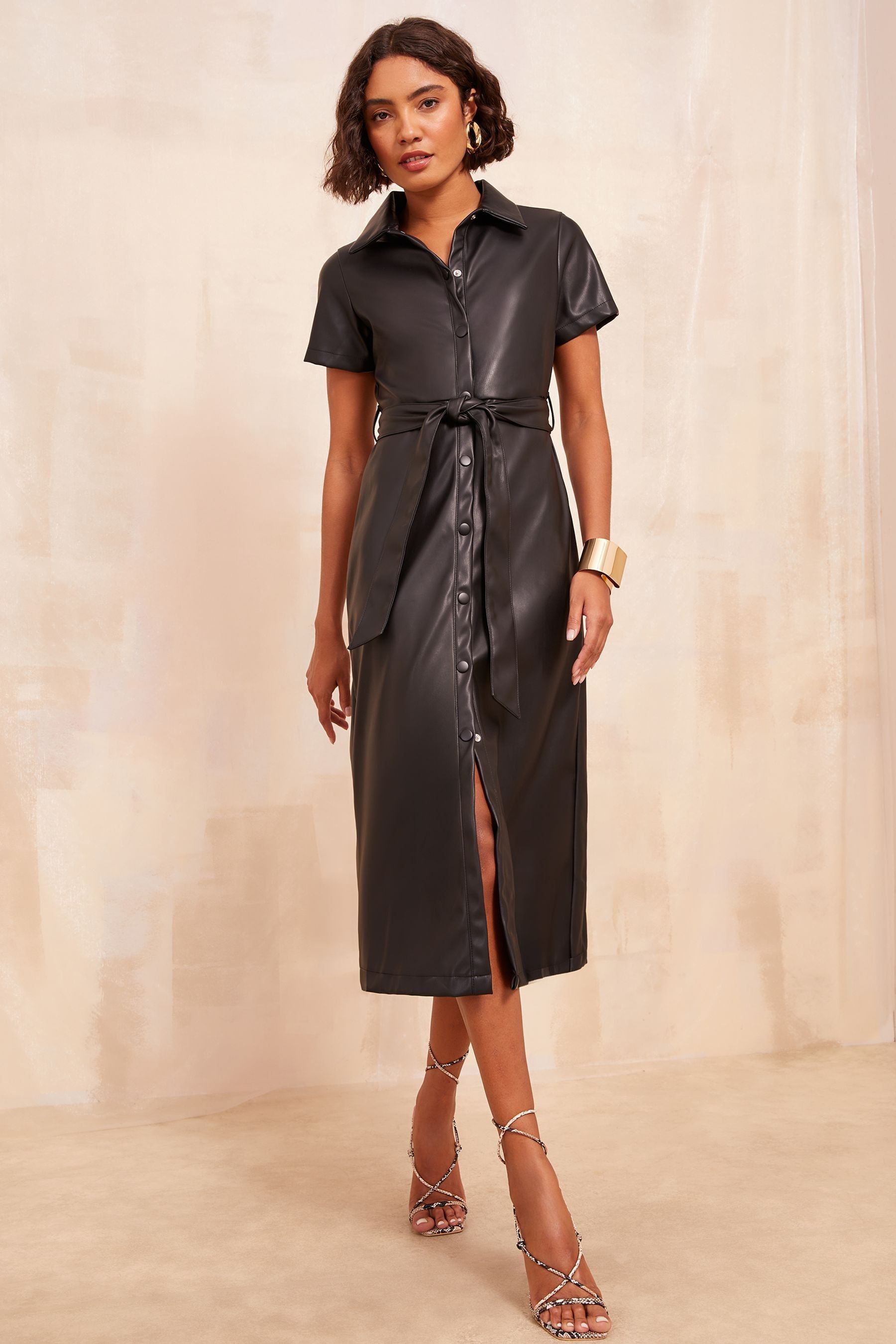 Leather pinafore dress uk top