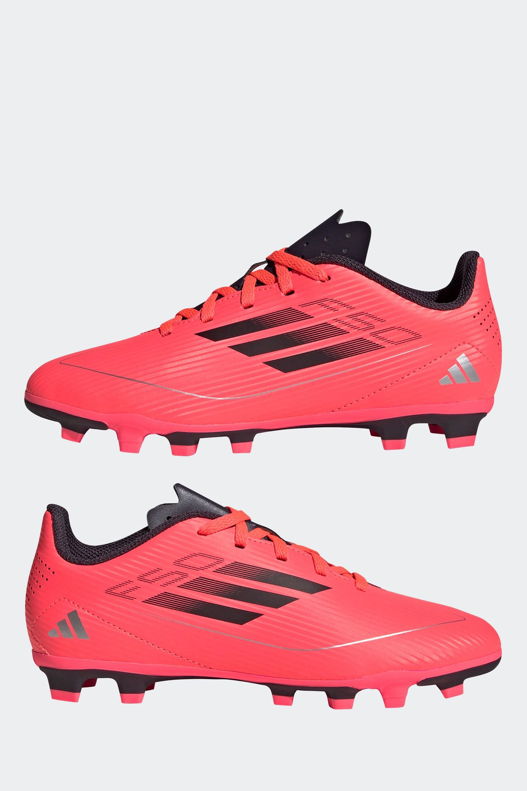 Red football boots kids deals