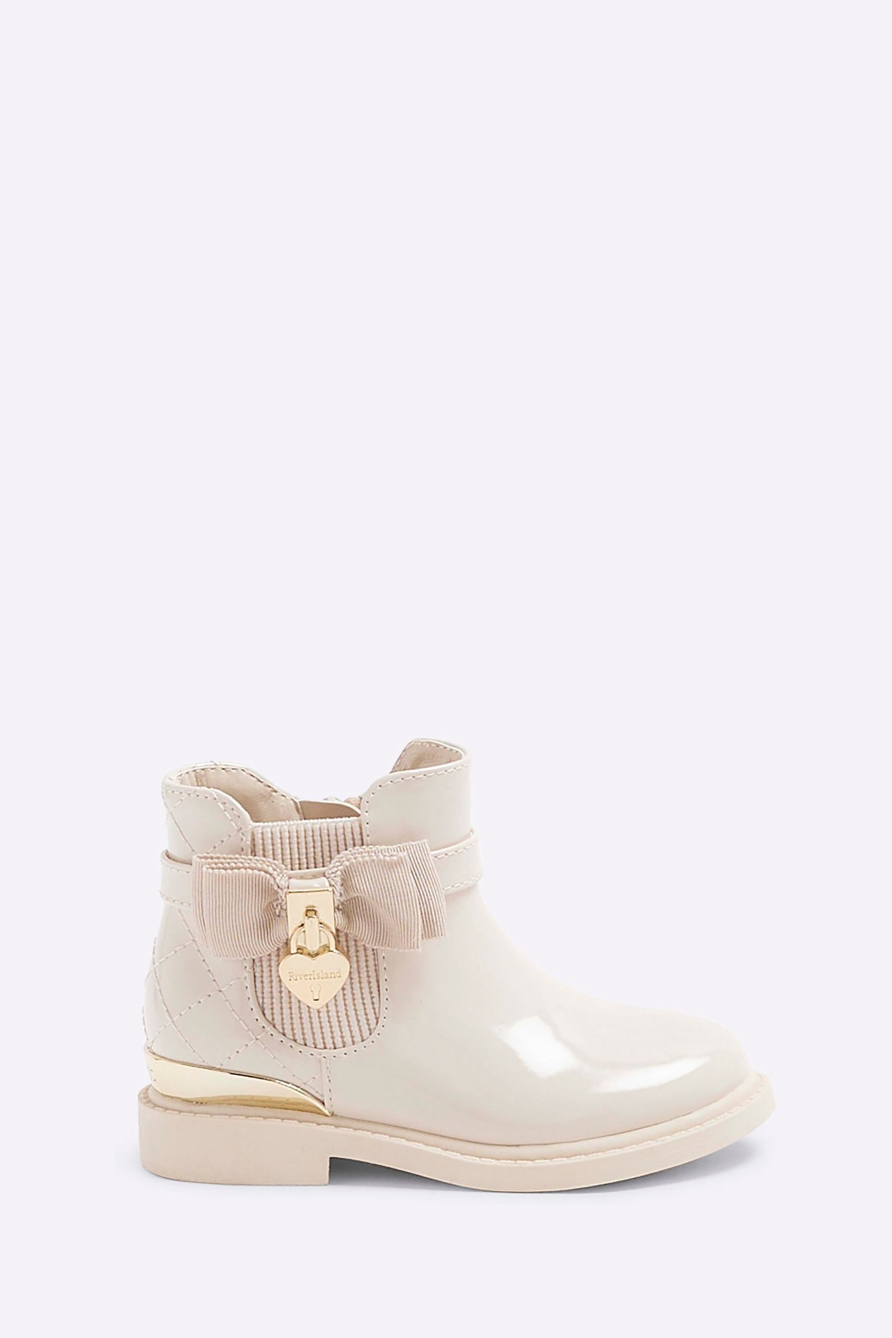 Buy River Island Cream Girls Patent Bow Padlock Boots from Next Netherlands