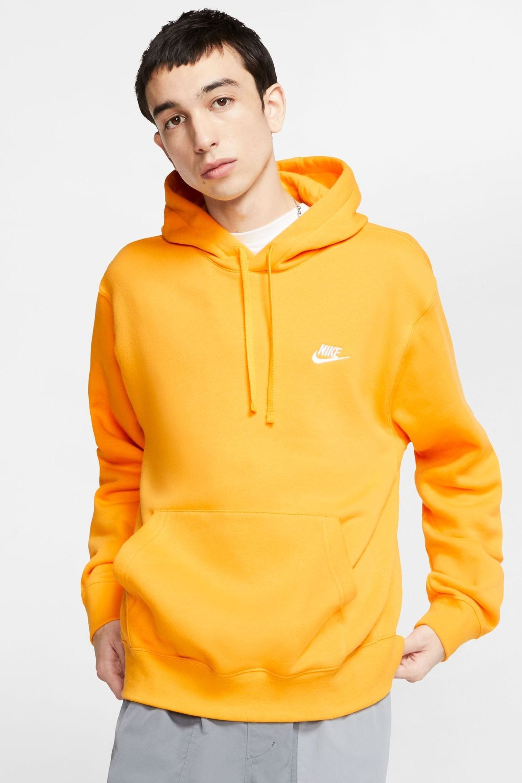 Buy Nike University Gold Club Pullover Hoodie from Next Luxembourg