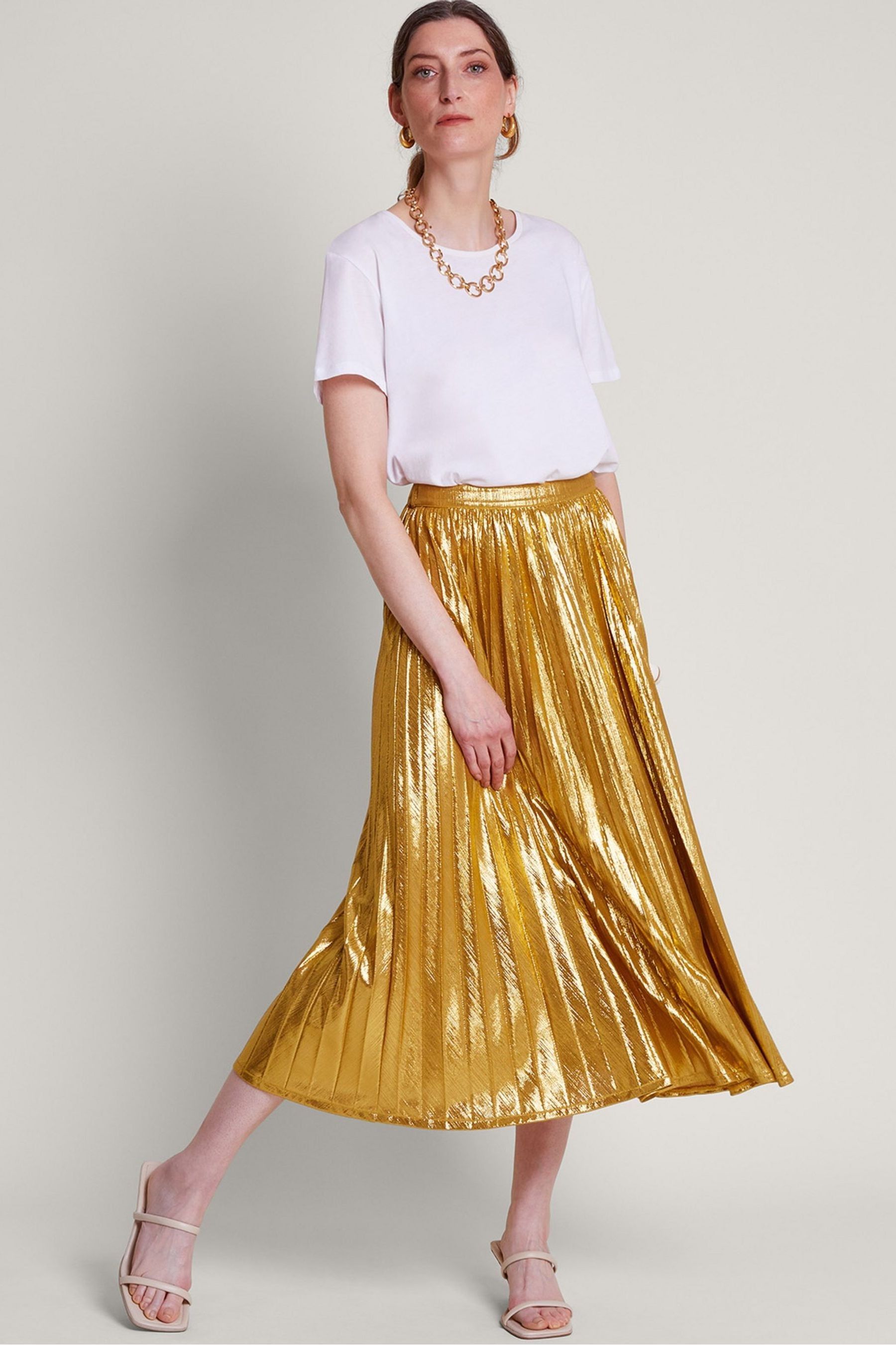 Gold pleated skirt next store