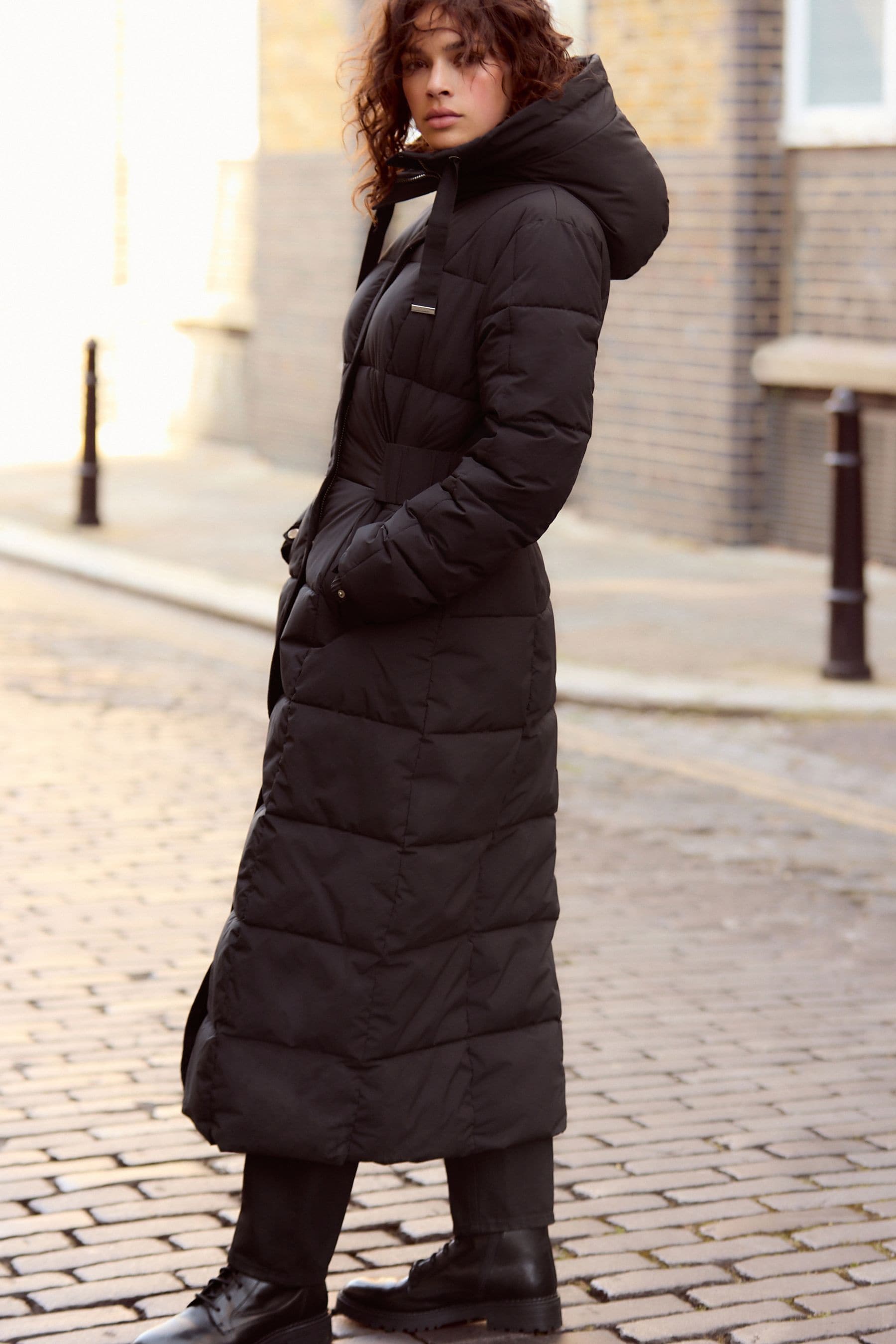 Buy Black Longline Waisted Shower Resistant Hooded Padded Coat from the Next UK online shop