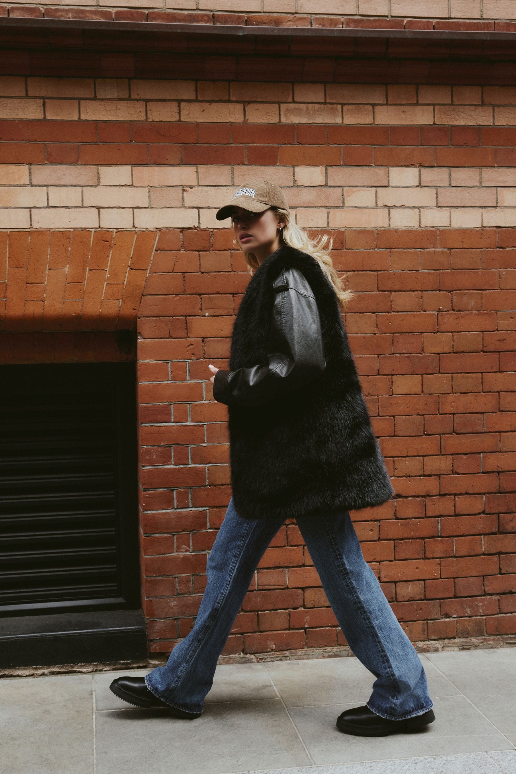 Longline black fur gilet new arrivals