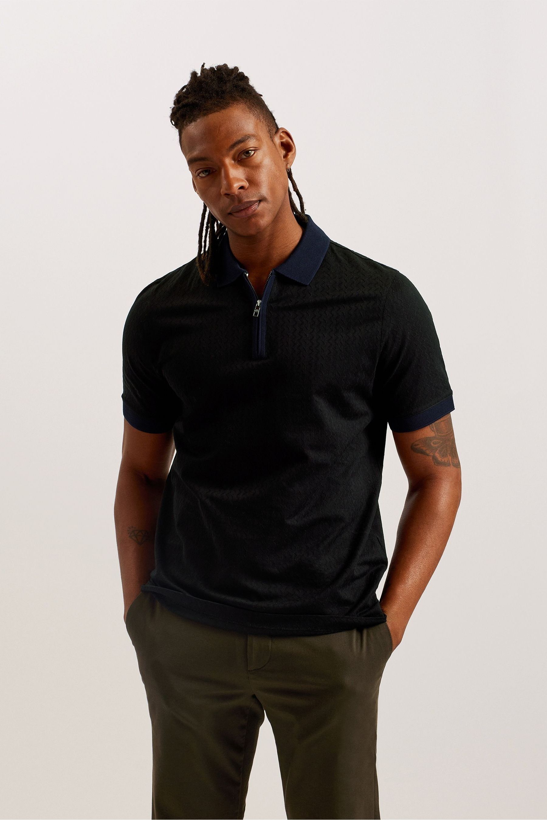 Buy Ted Baker Black Arnival Short Sleeve Regular Textured Zip Polo Shirt from Next Luxembourg