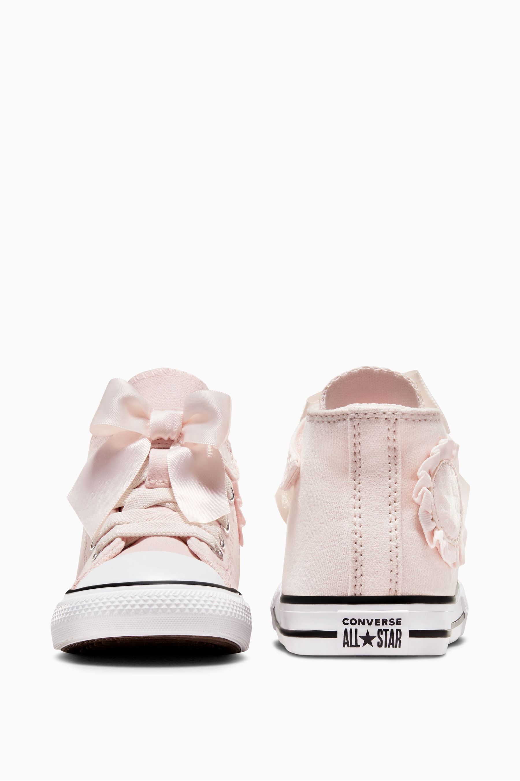 Pink bow converse discount