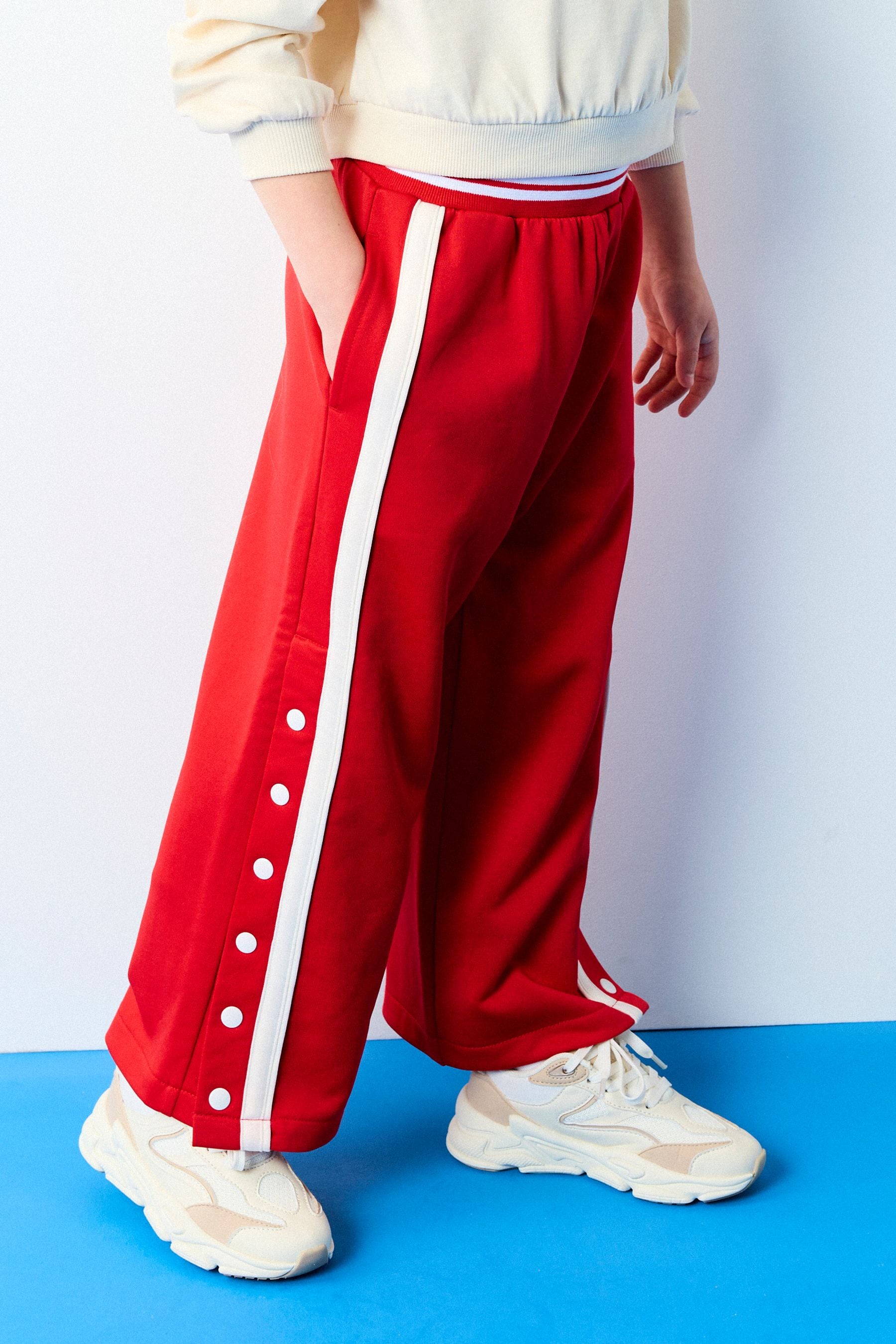 Red and white striped joggers outlet