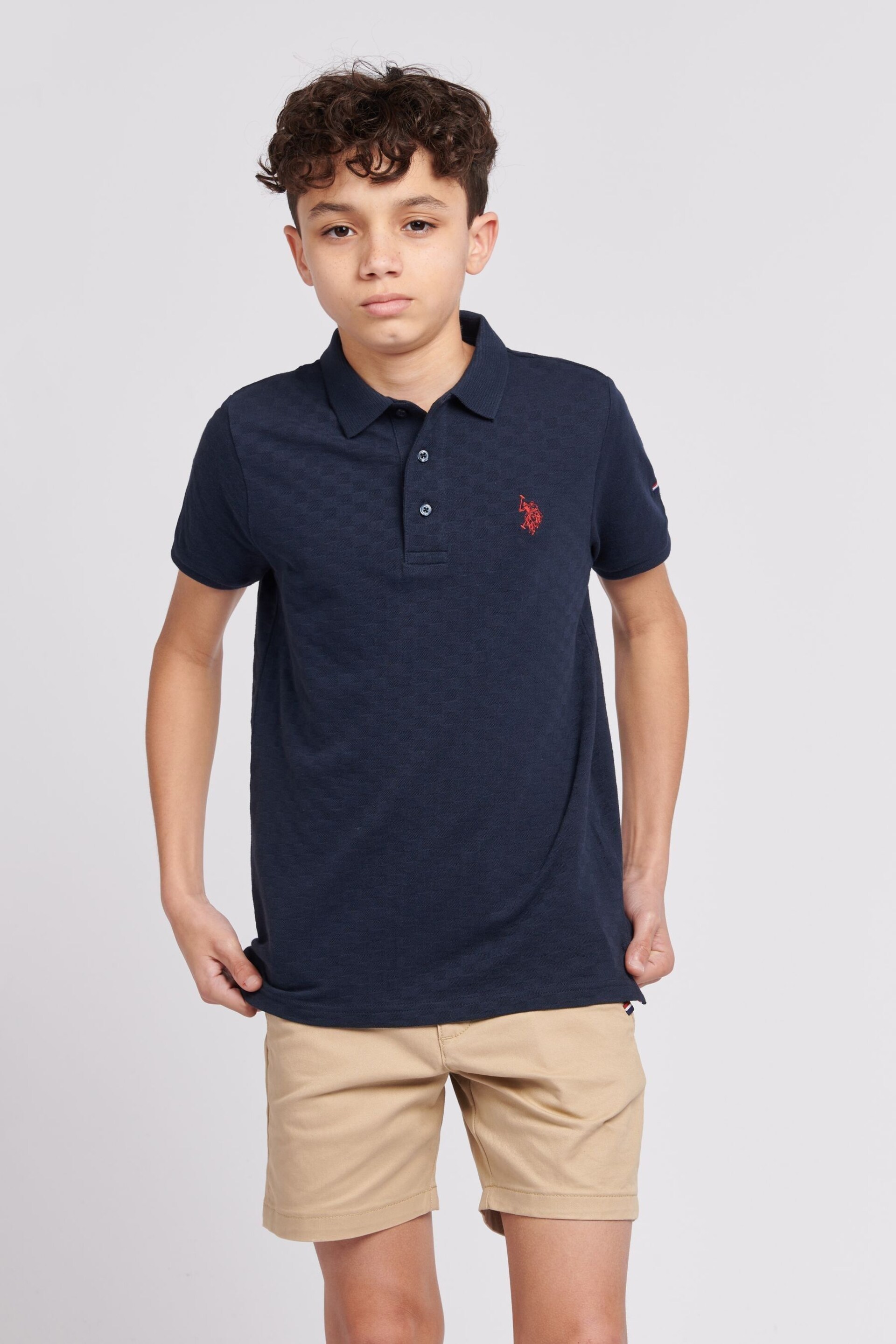 U.S. Polo Assn. Boys Blue Check Texture Polo Shirt - Image 1 of 6