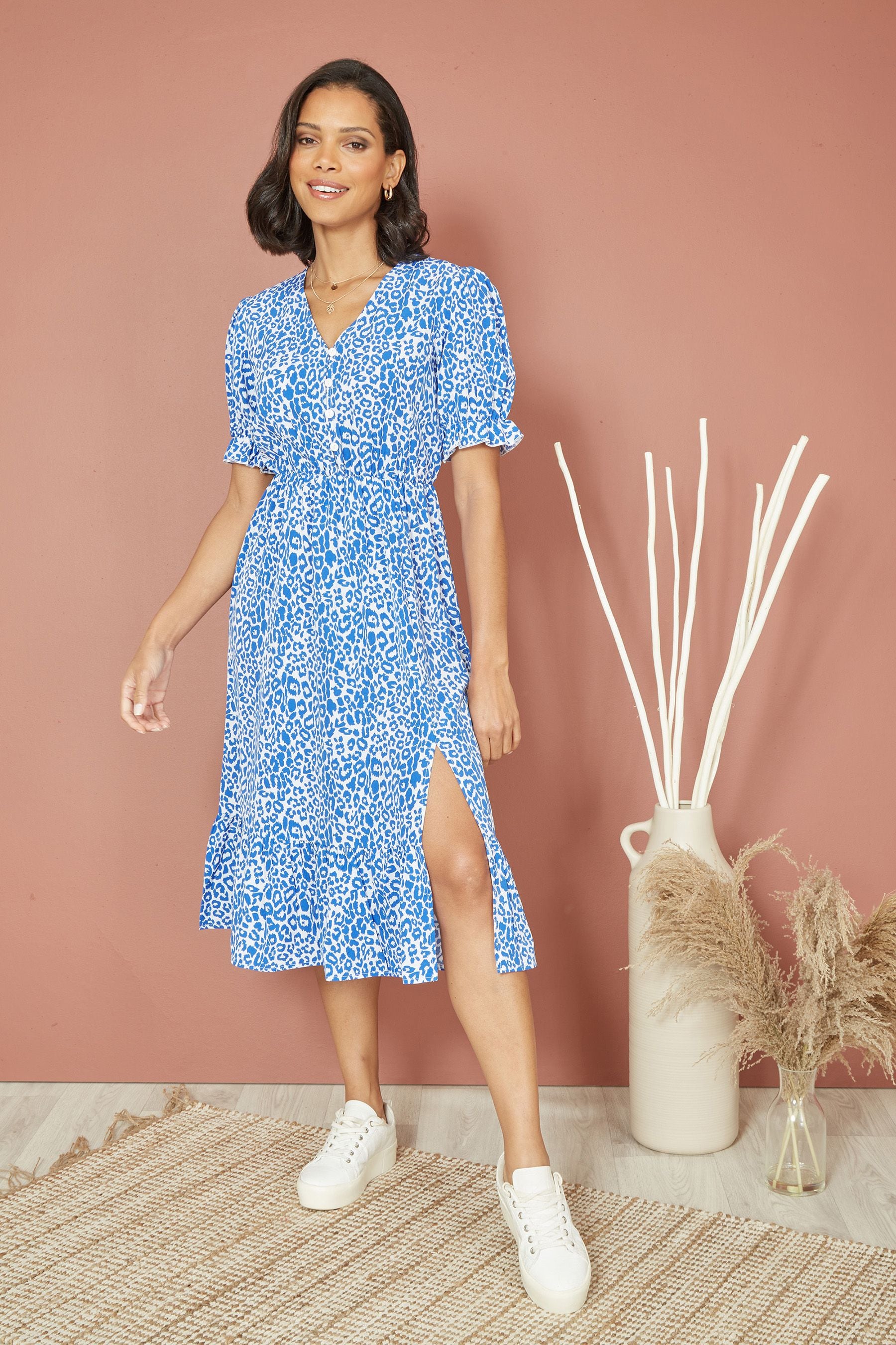Mela leopard print wrap dress online