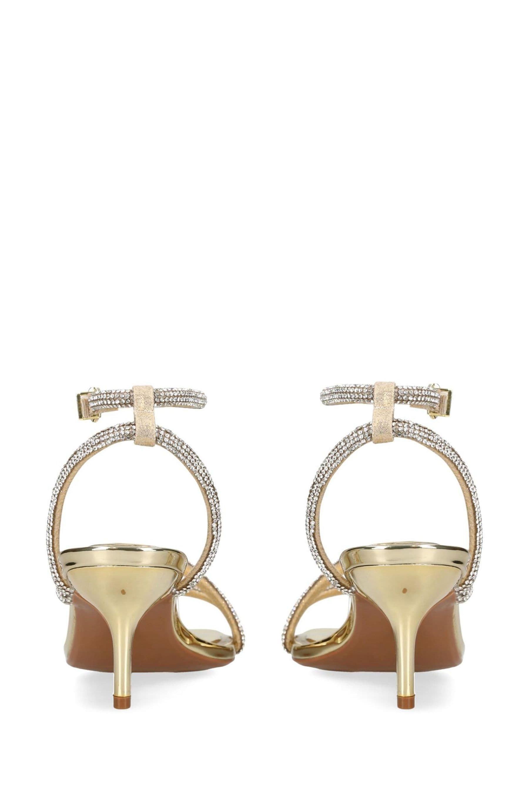 Gold carvela heels deals