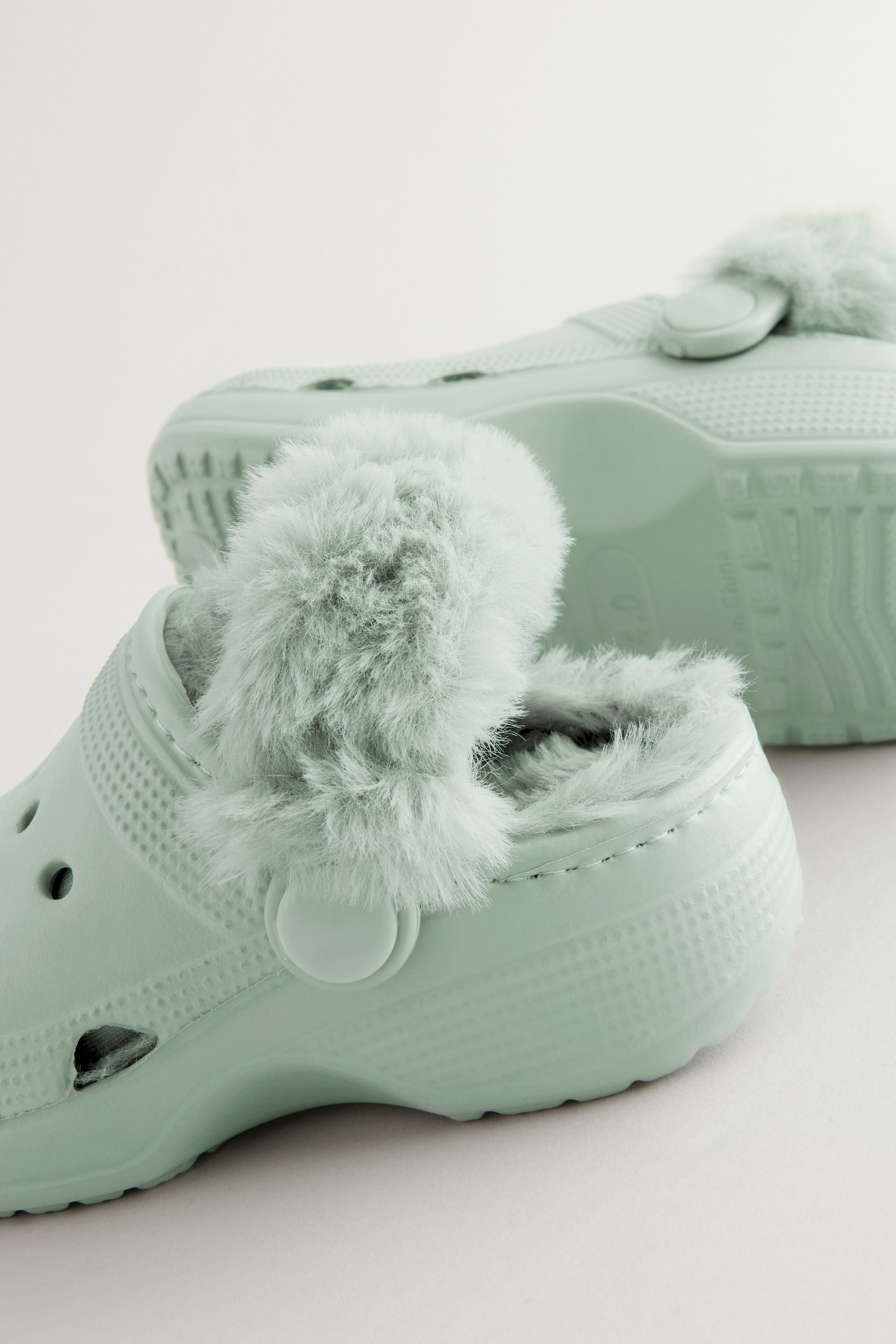 Green crocs with fur online