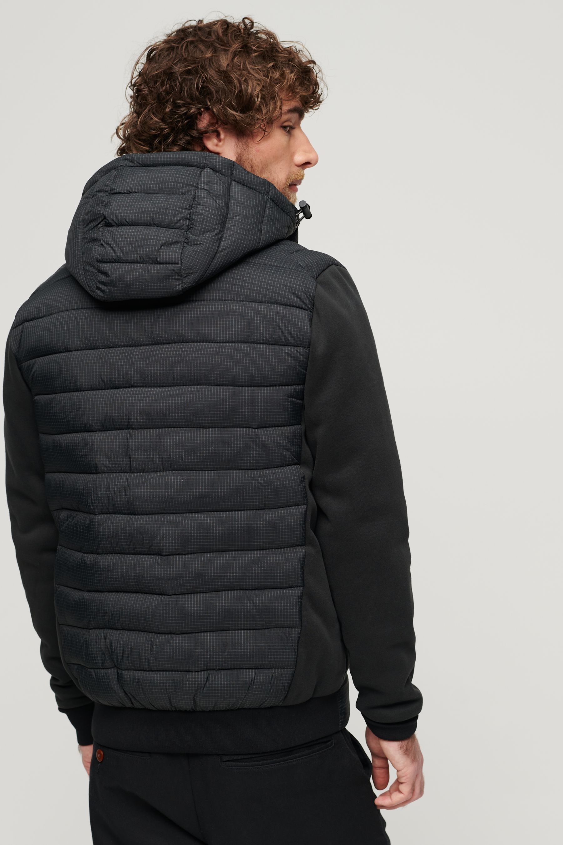 Buy Superdry Black Hooded Storm Hybrid Padded Jacket from Next Luxembourg