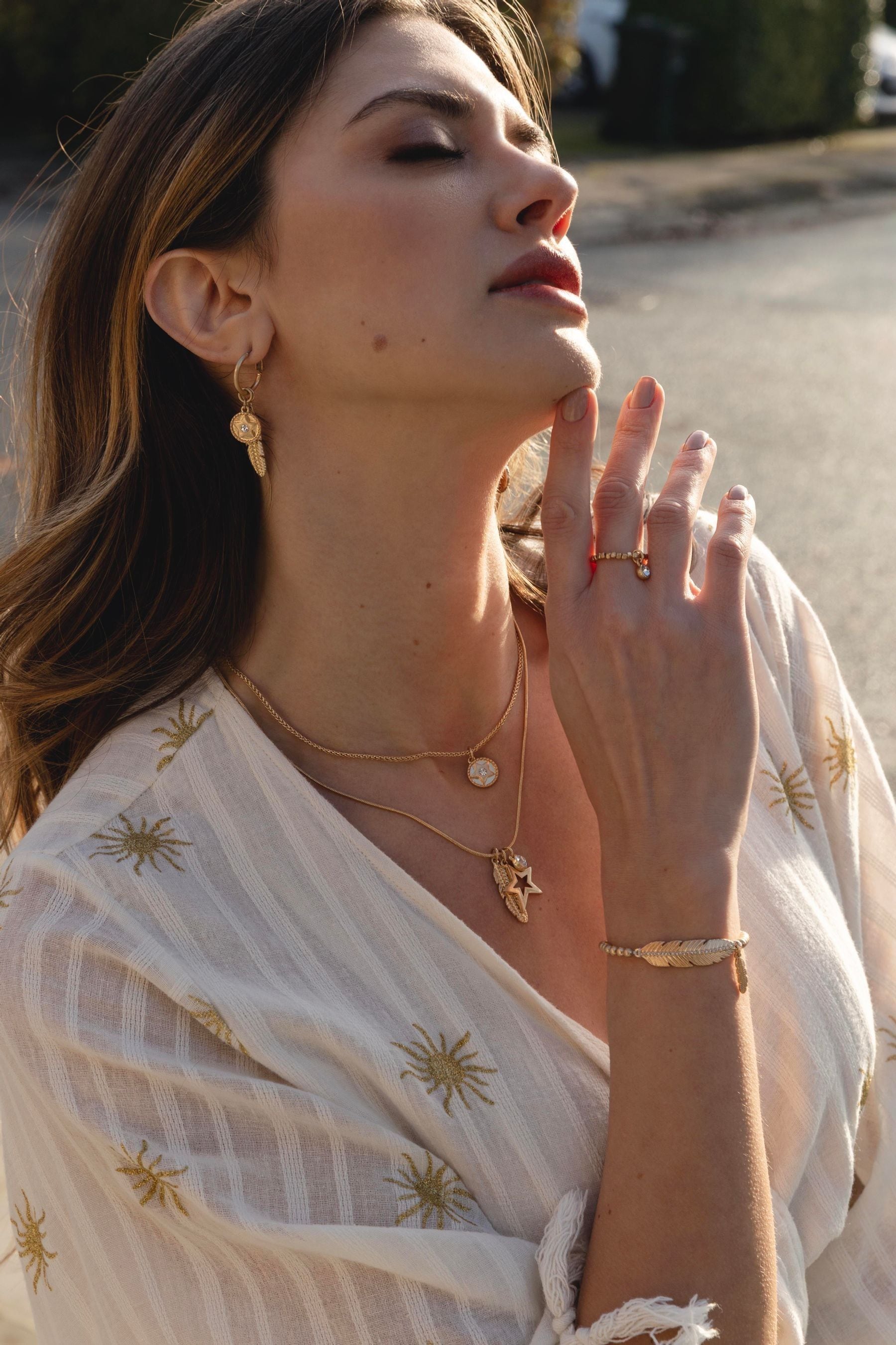 Buy Bibi Bijoux Gold Tone Celestial Feather Interchangeable Hoop Earrings from Next Austria
