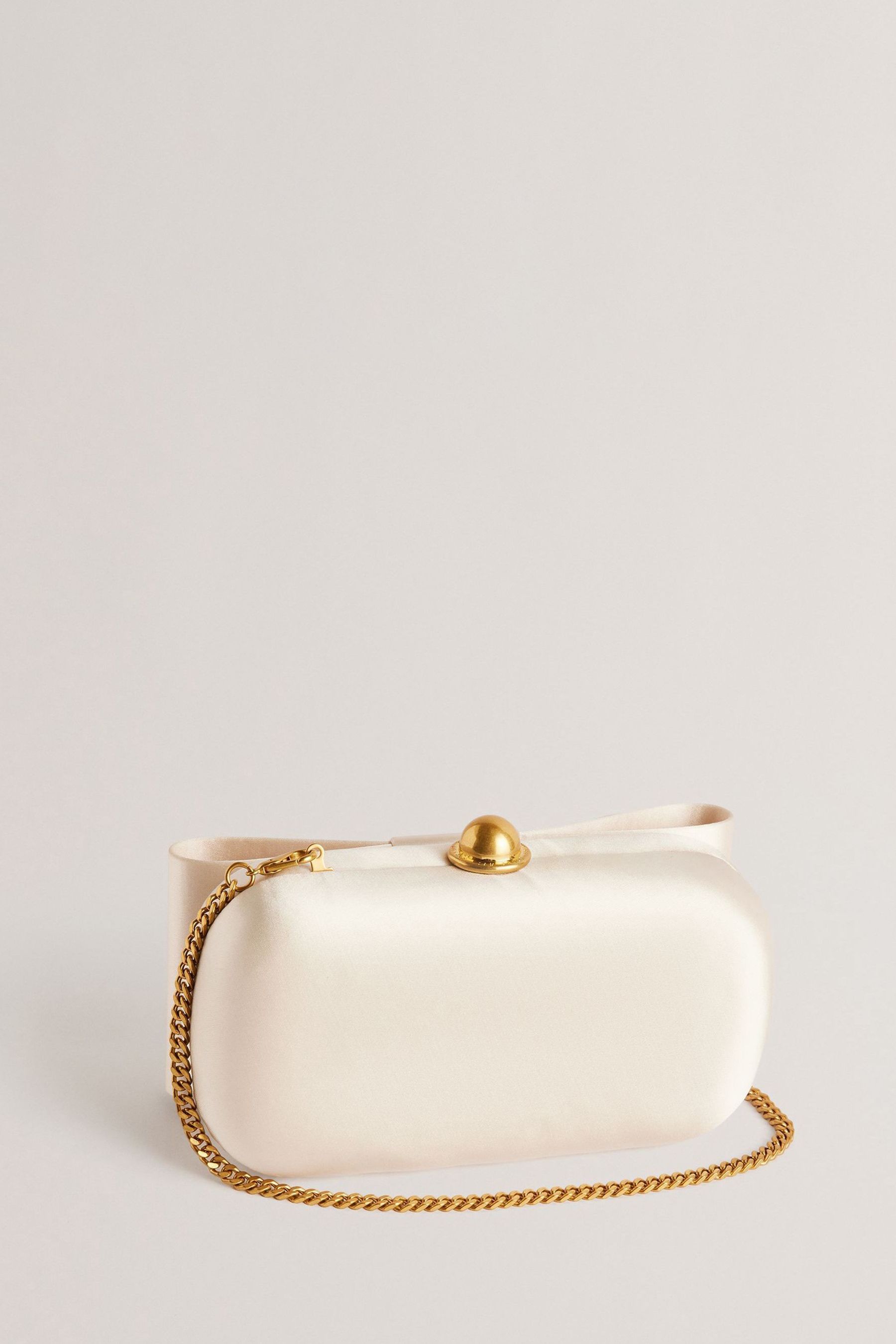 Buy Ted Baker Cream Bowelaa Satin Bow Clutch Bag from Next Luxembourg