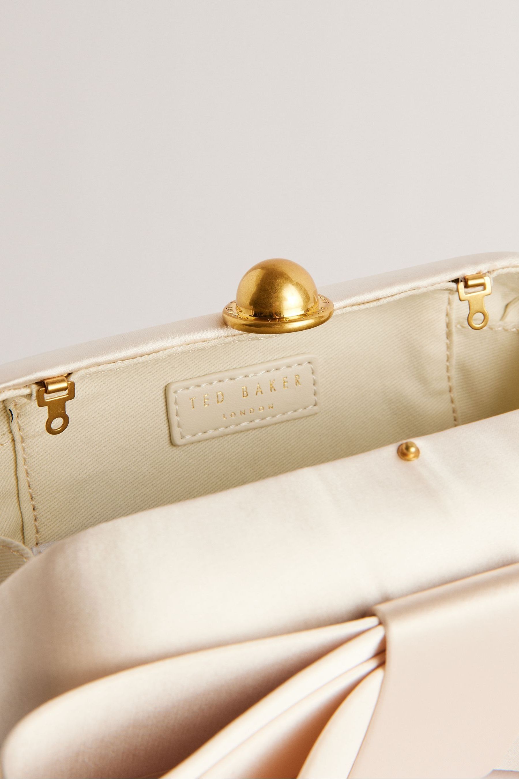 Buy Ted Baker Cream Bowelaa Satin Bow Clutch Bag from Next Luxembourg