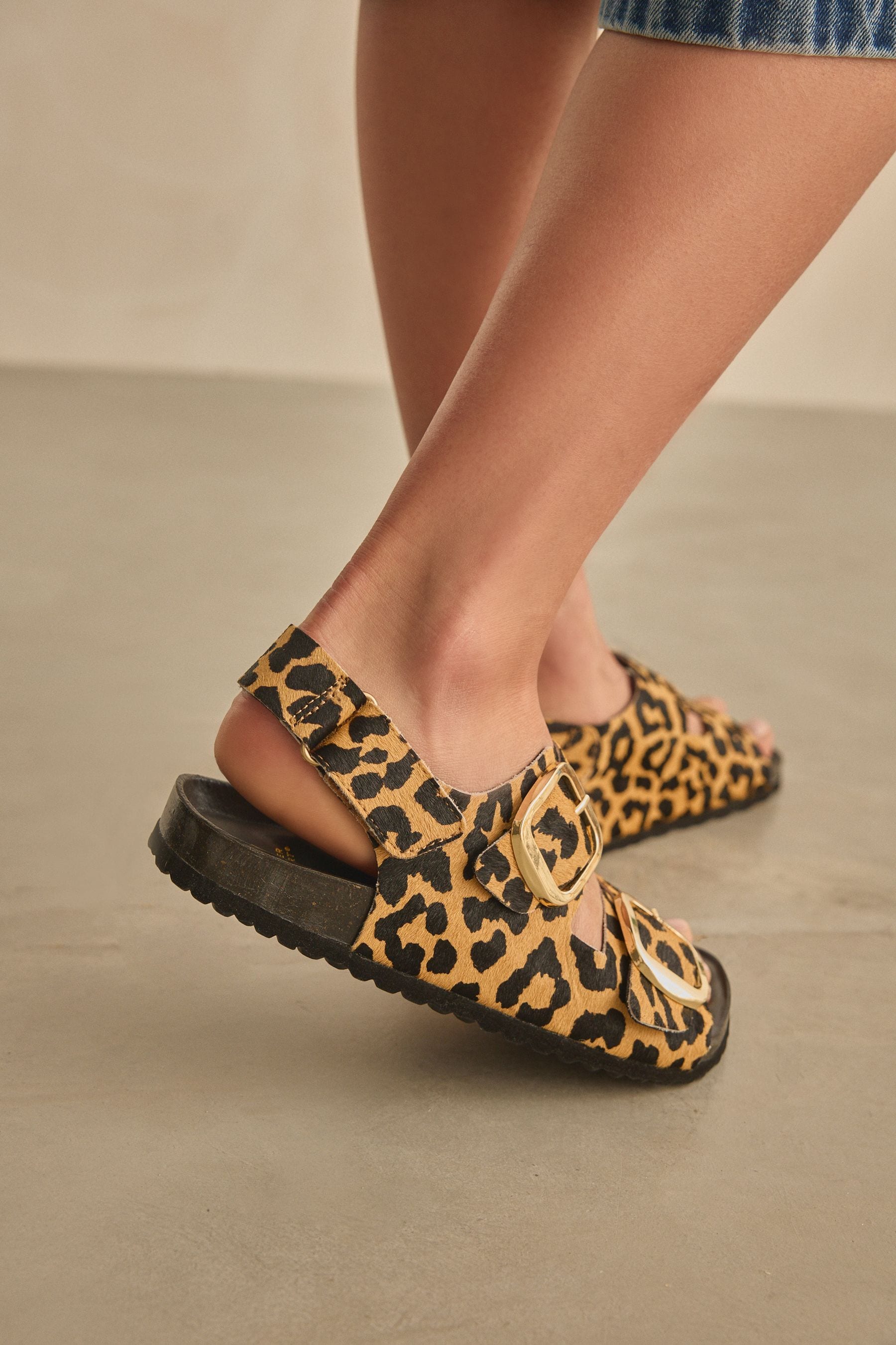 Animal print footbed sandals on sale