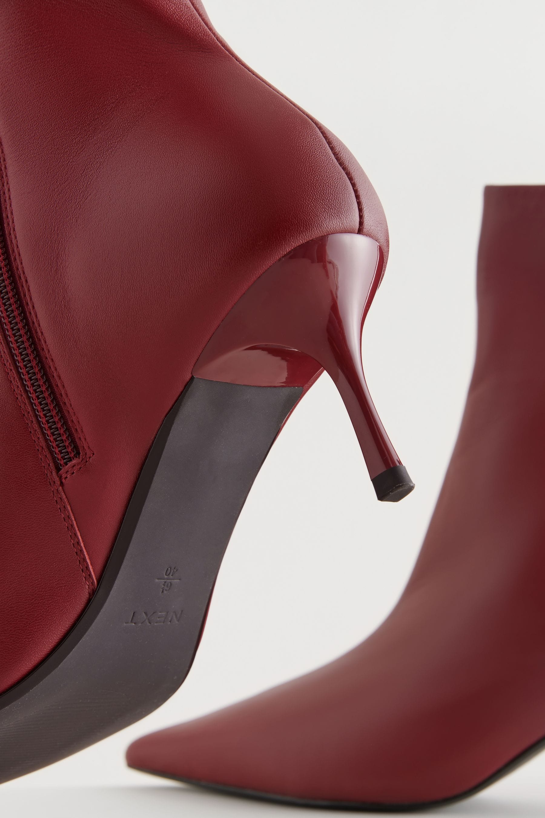 Red heeled ankle boots top