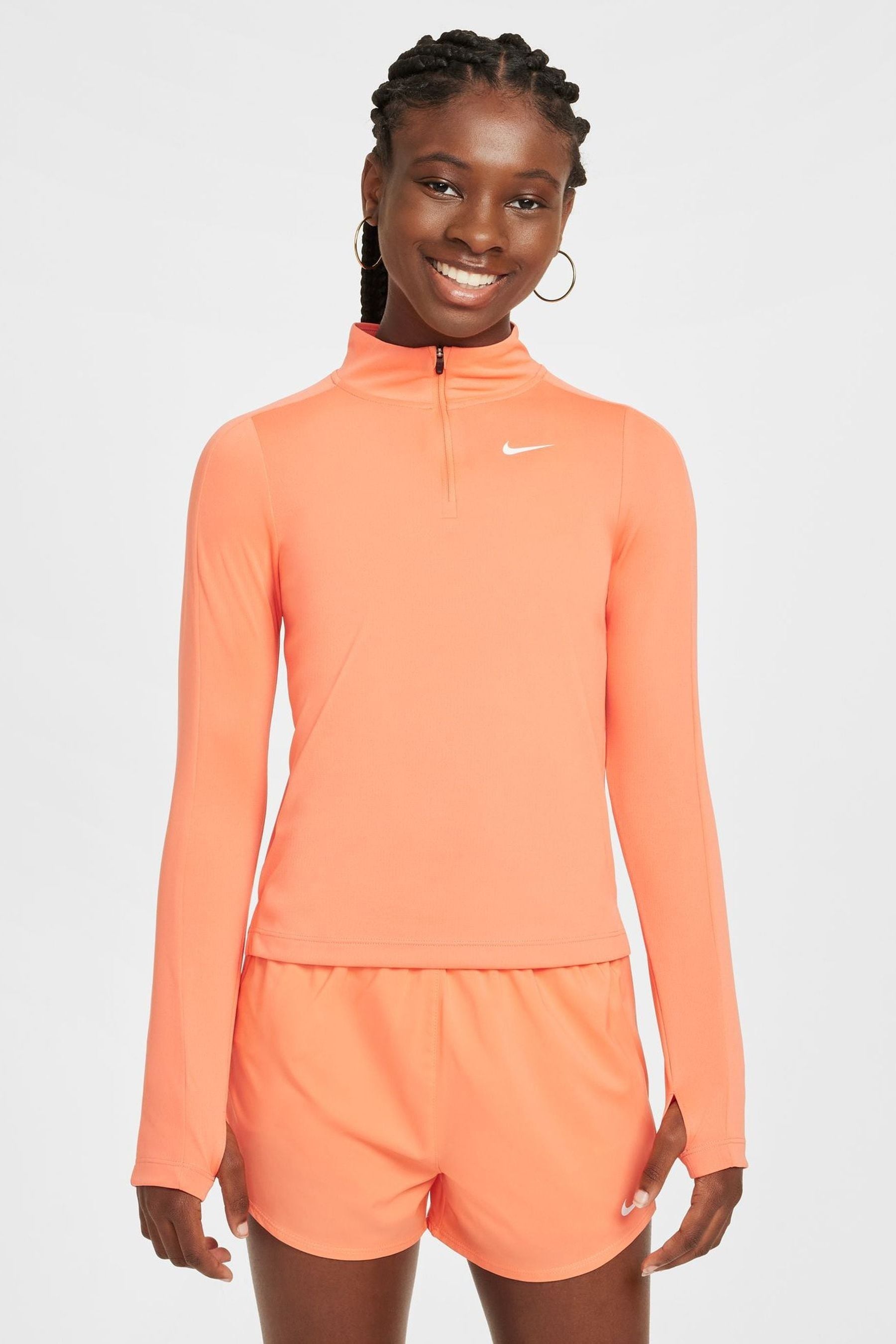 Buy Nike Orange Mango Dri FIT Long Sleeve Half Zip Top from Next Iceland