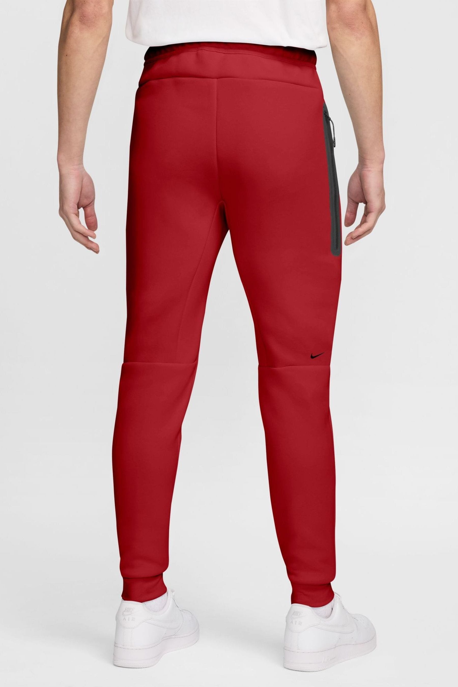 Red nike tech fleece joggers sale