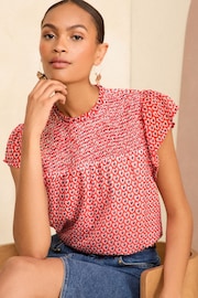 Love & Roses Red Geo Printed Shirred Yoke Shell Top - Image 1 of 4