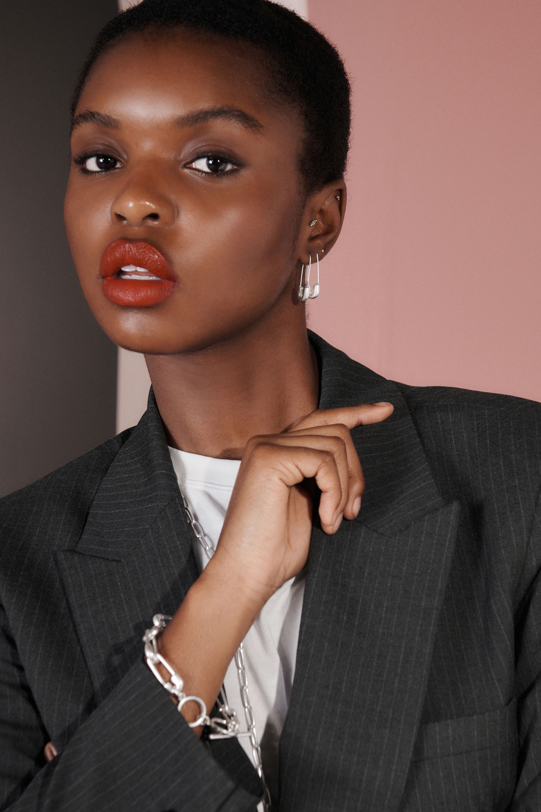 Next earrings top