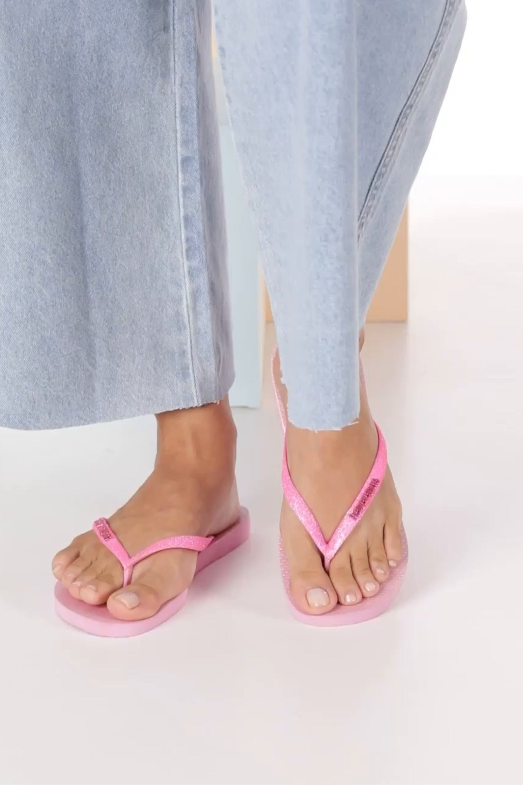 Iridescent flip flops hotsell