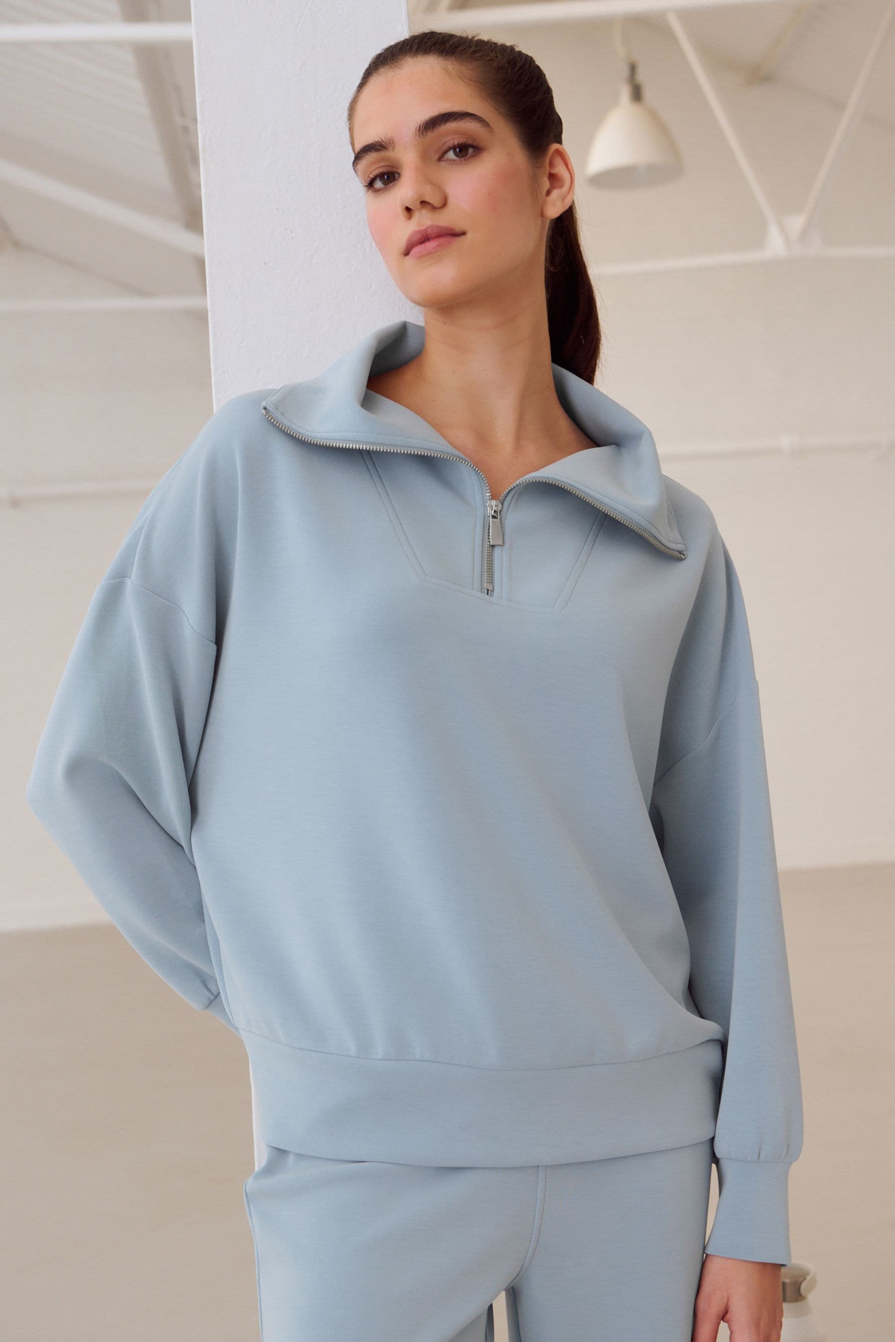 Light blue quarter zip sweatshirt hot sale