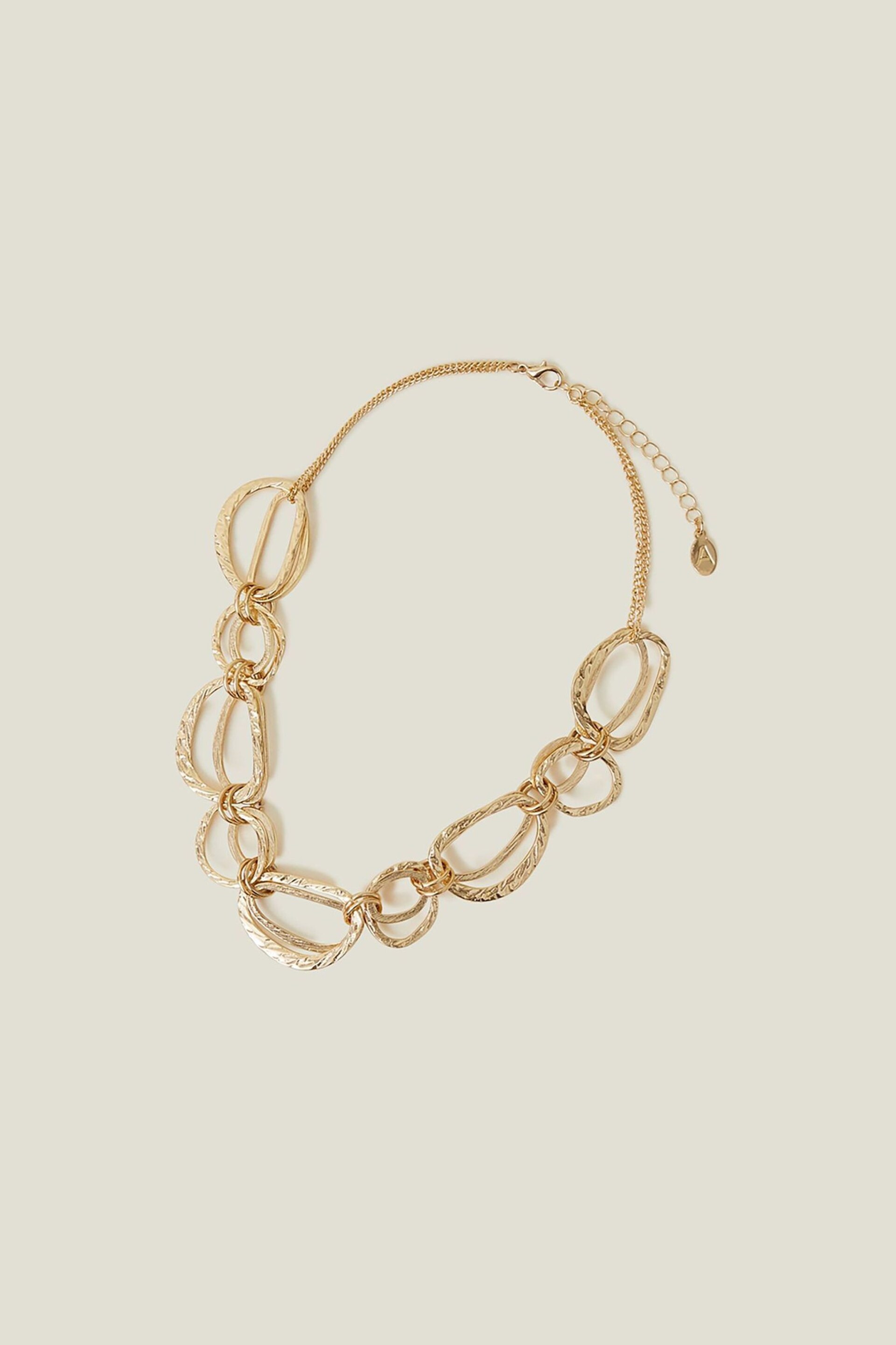 Accessorize Gold Tone Textured Metal Circle Necklace - Image 1 of 3
