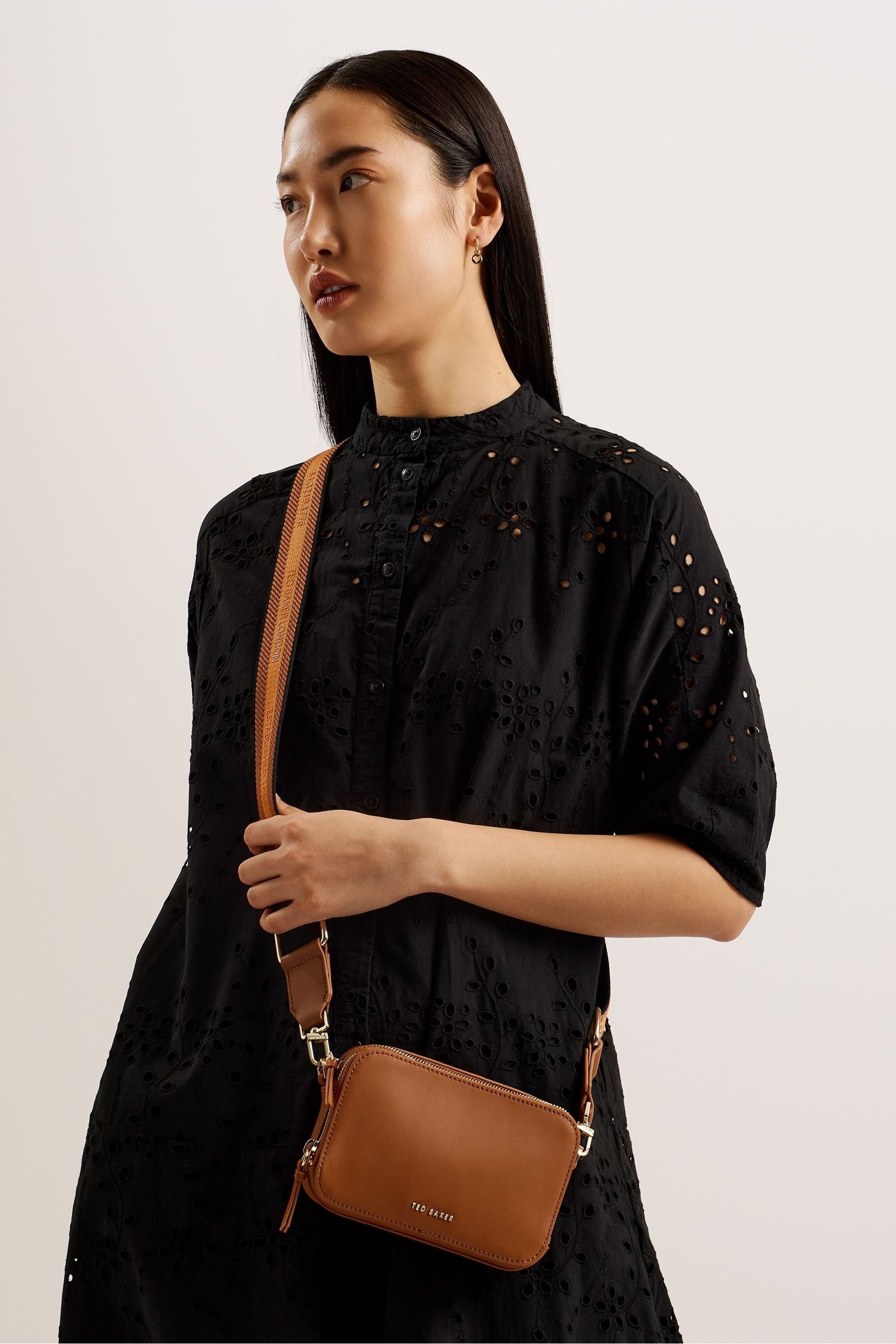 Buy Ted Baker Brown Stunna Webbing Leather Cross Body Mini Bag from Next Oman