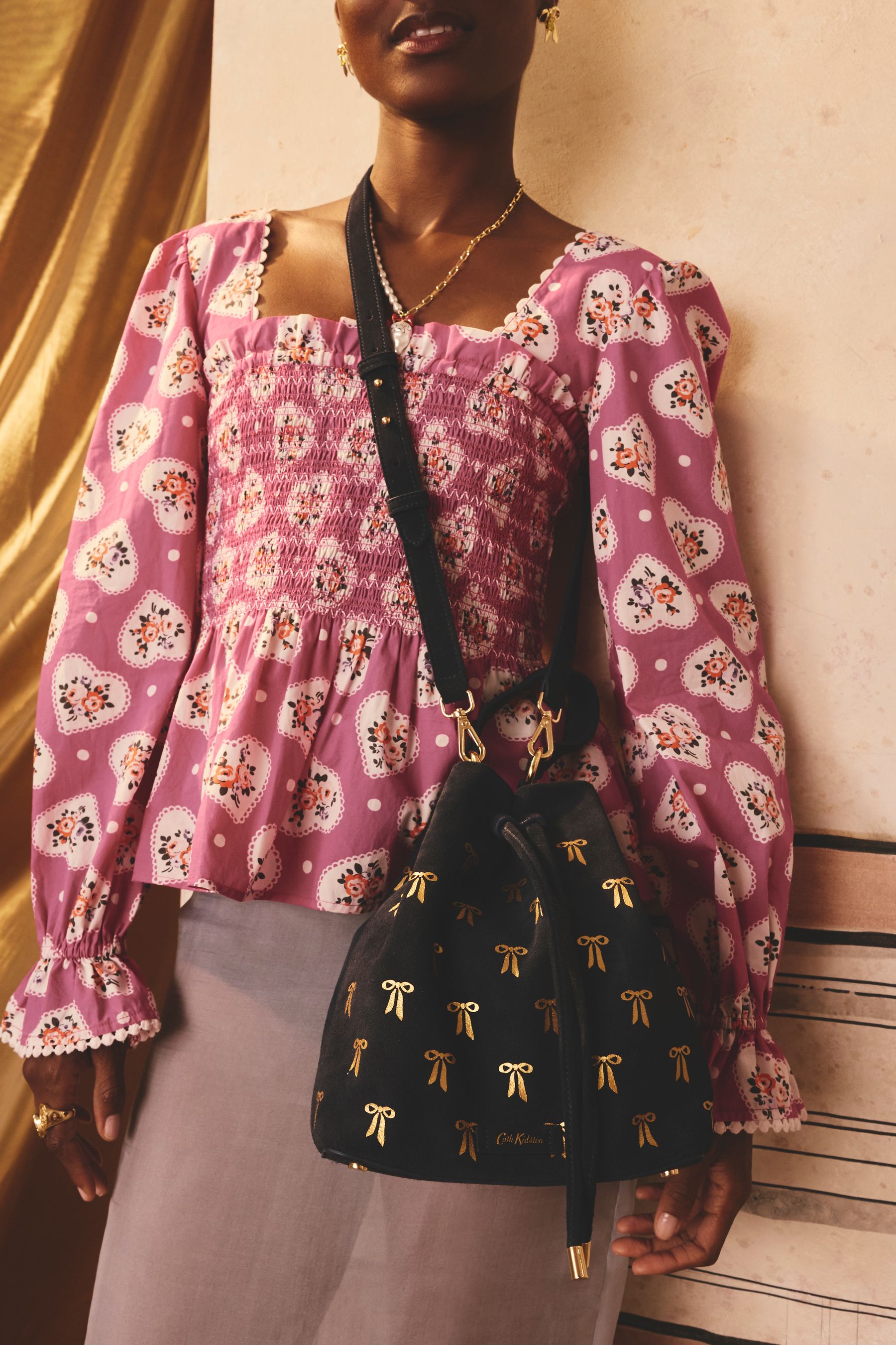 Bow bucket bag on sale