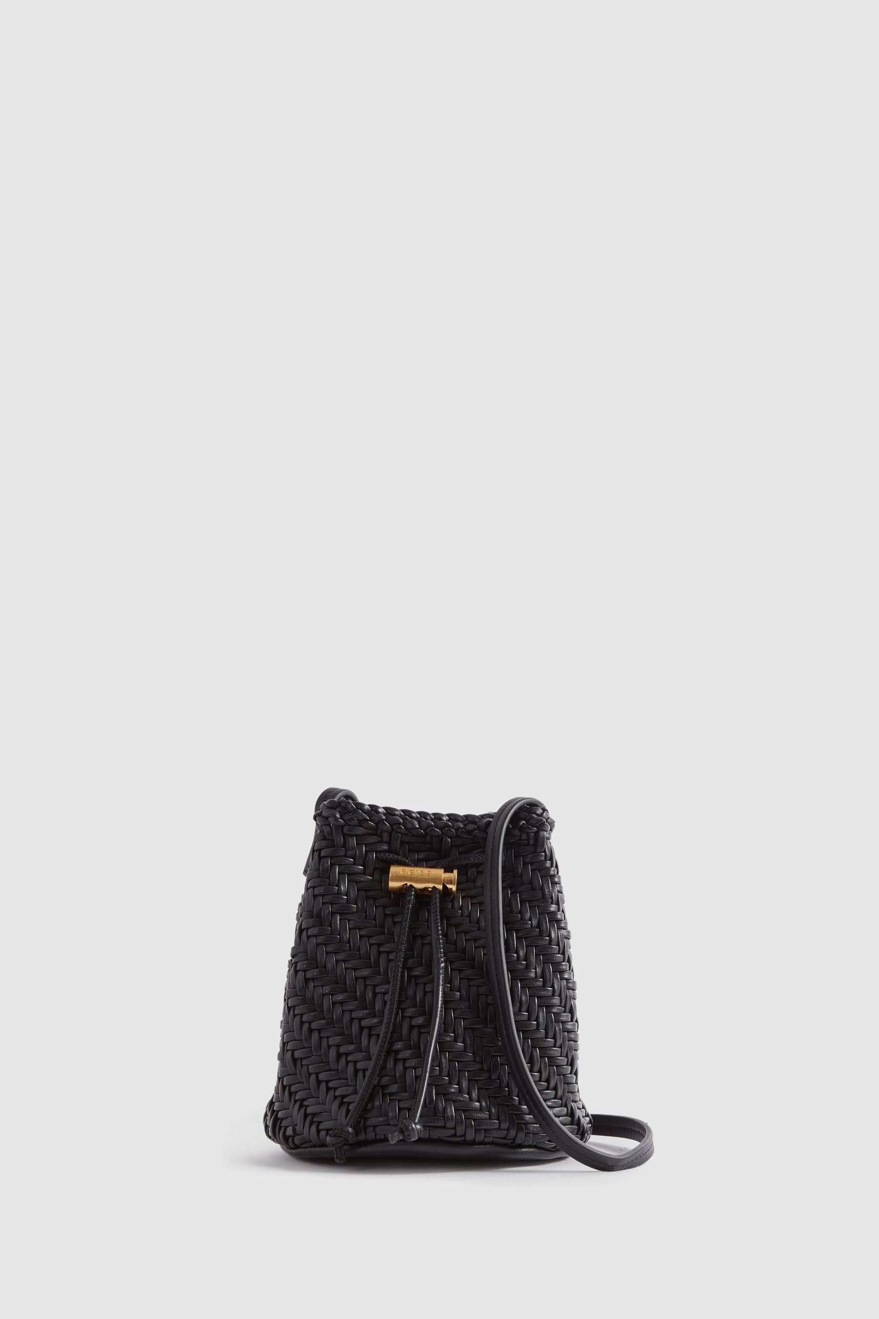 Woven leather bucket bag store