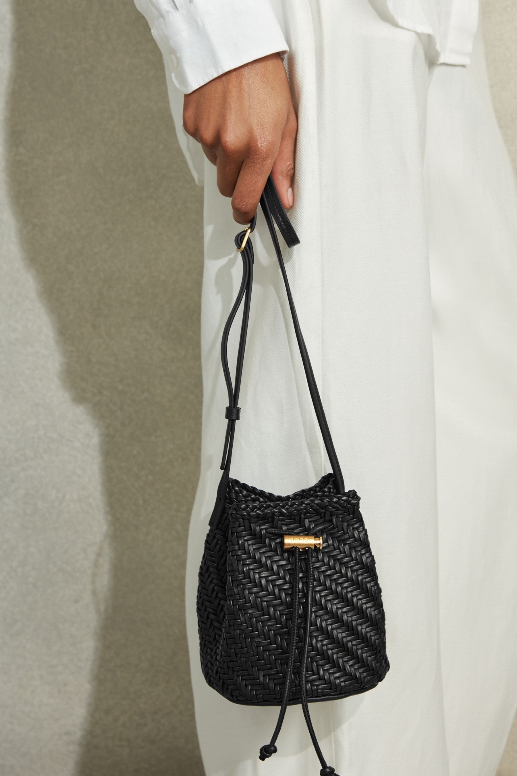 Buy Reiss Black Berti Woven Leather Bucket Bag from Next Luxembourg