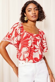 Friends Like These Red Floral Bardot Neck Flutter Sleeve Blouse - Image 1 of 4