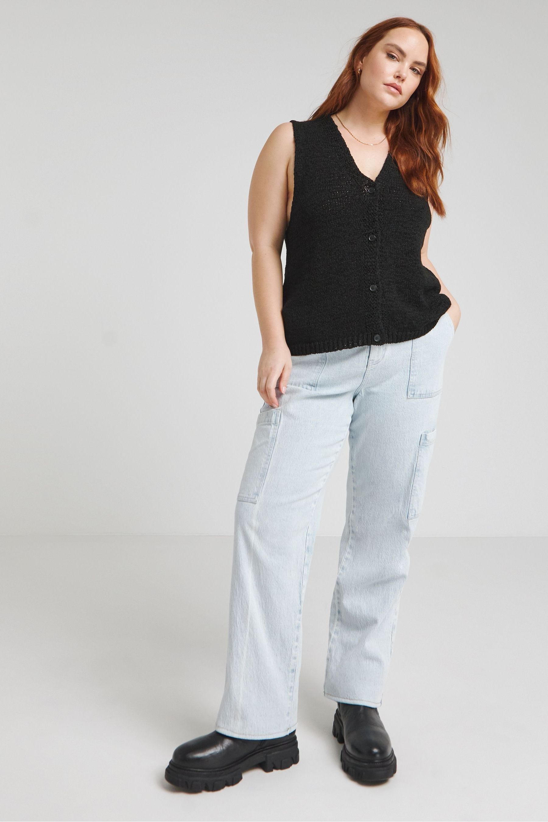 Black knitted waistcoat deals