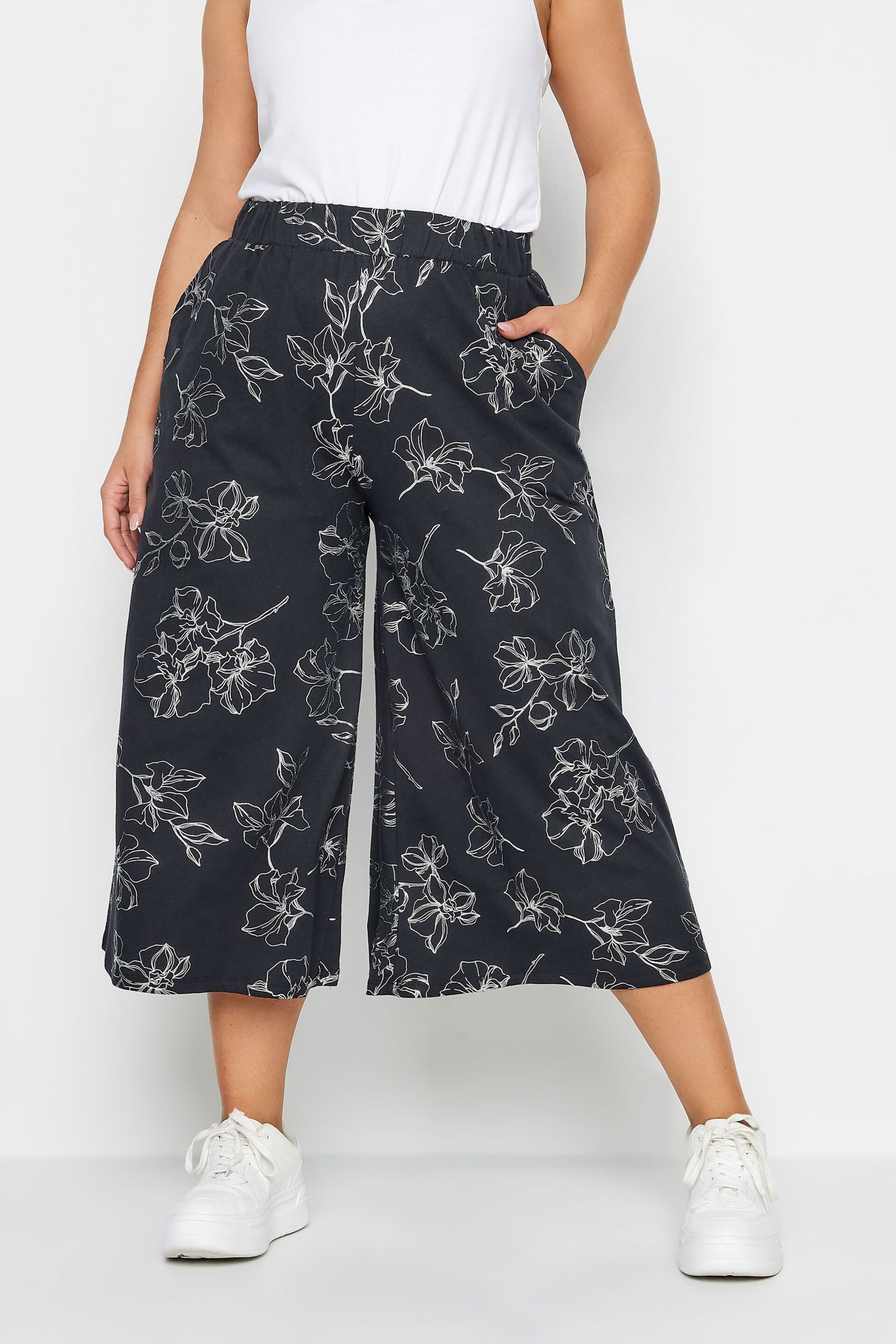 Yours Curve Black Leaf Print Wide Leg Trousers - Image 1 of 4