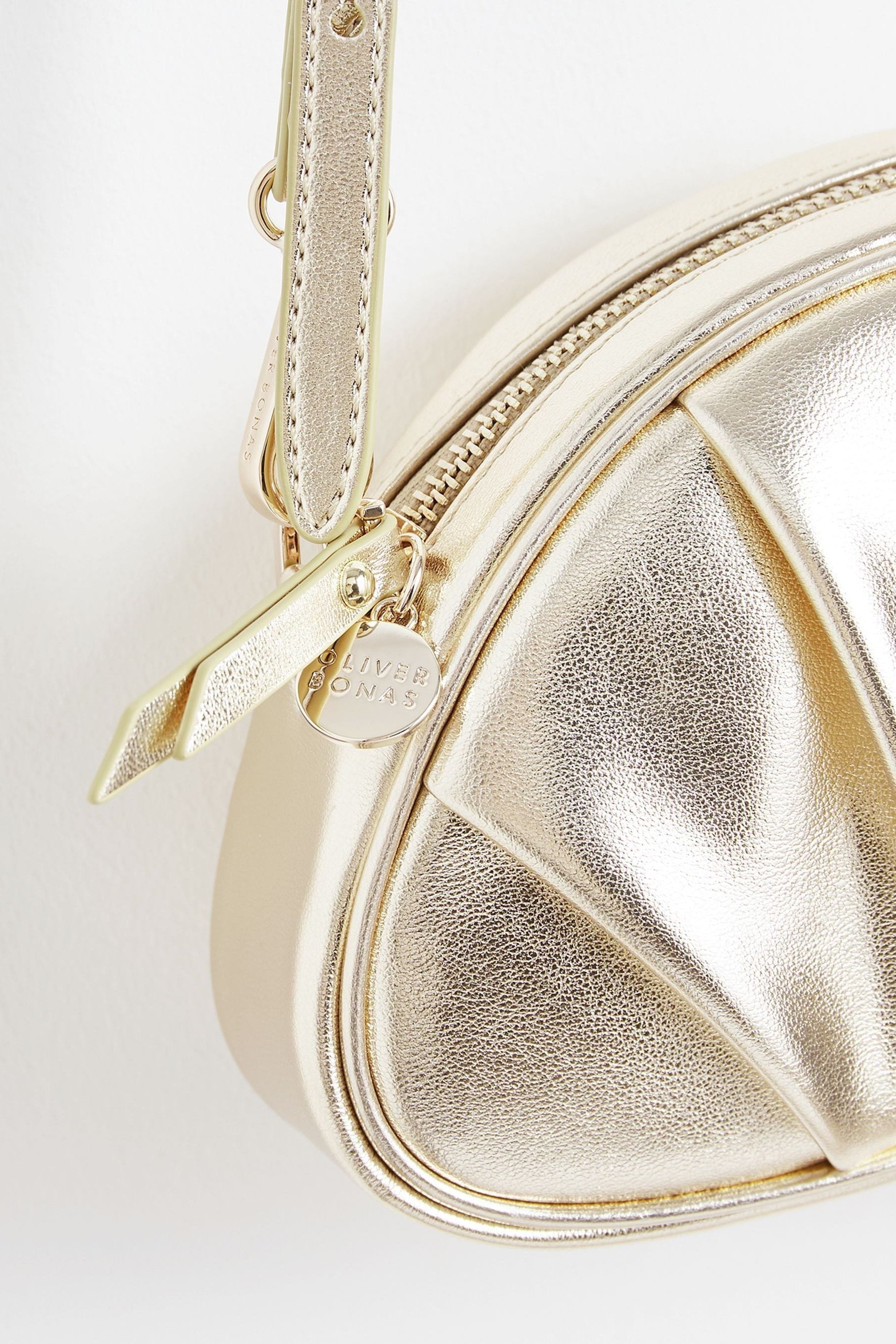 Buy Oliver Bonas Gold Croissant Clutch Bag from Next Belgium