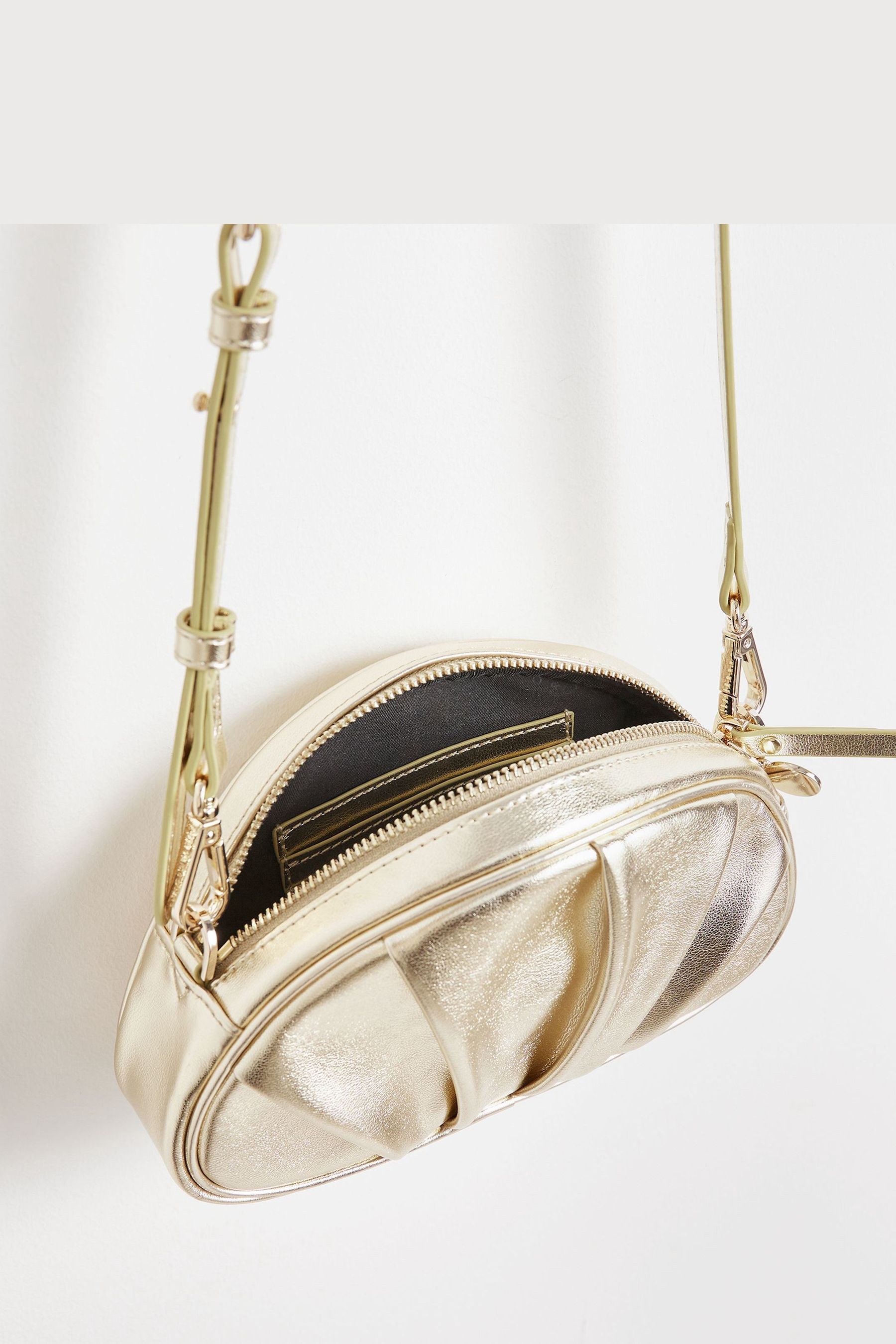 Gold round clutch best sale