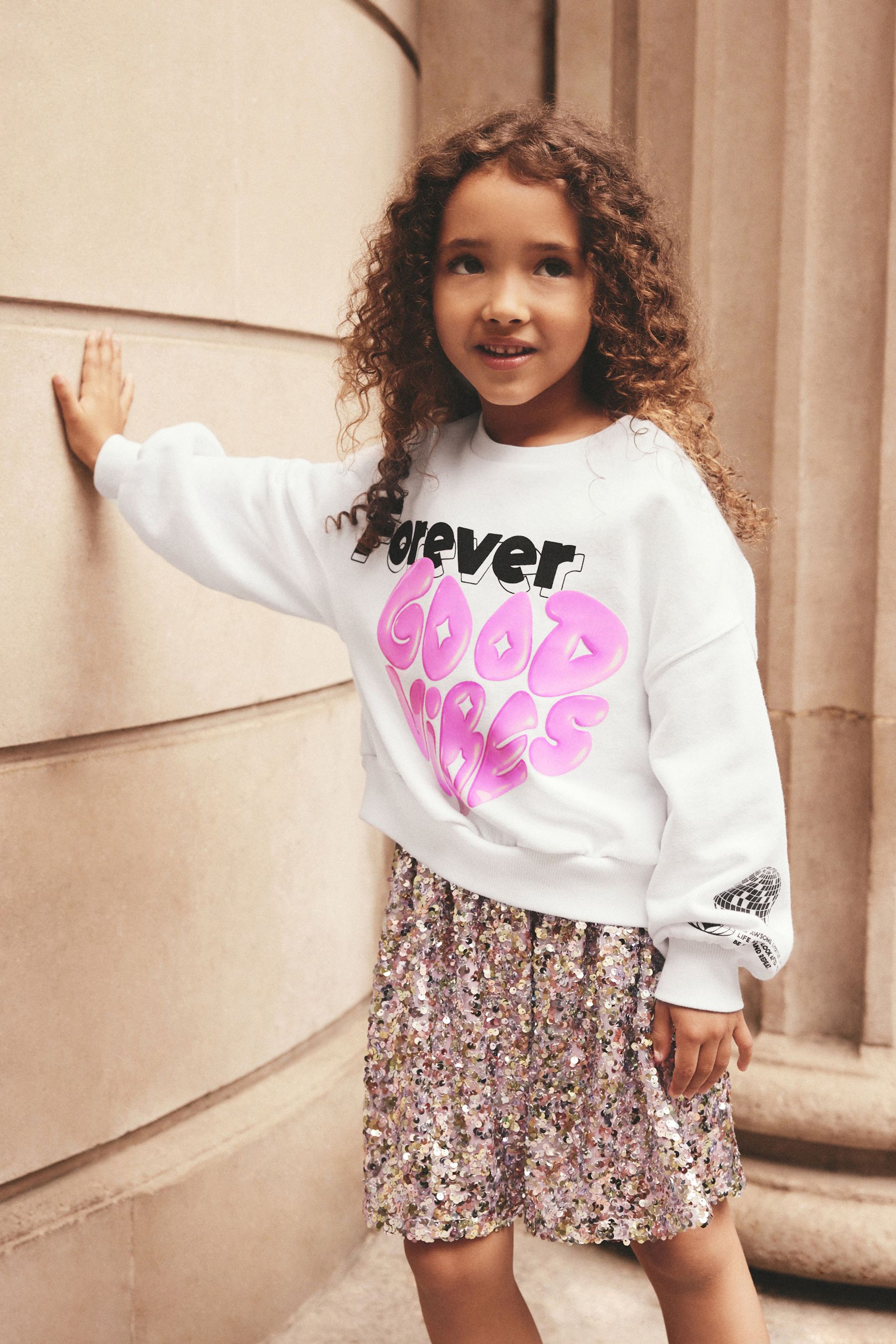Pink slogan jumper outlet