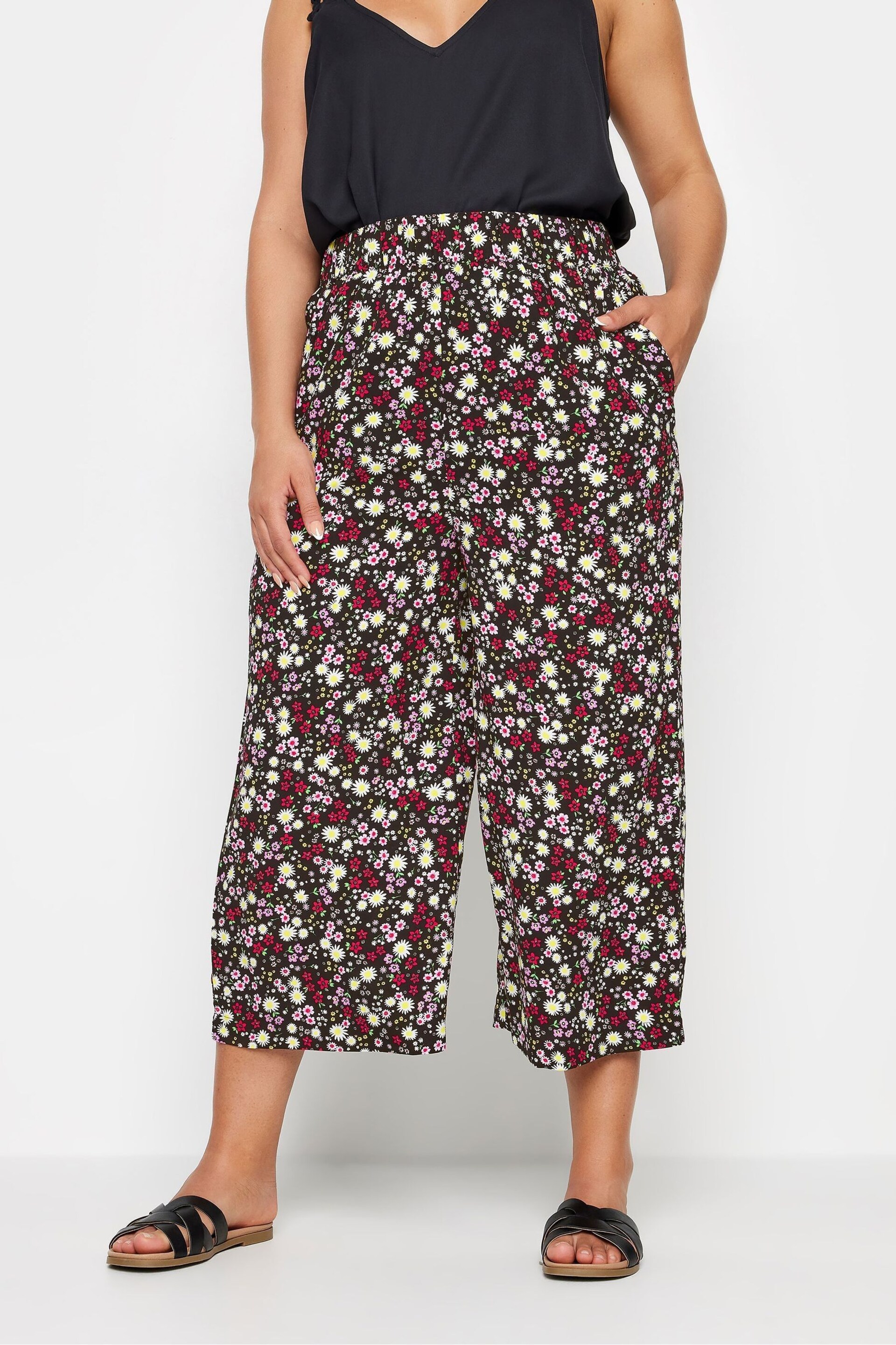 Yours Curve Black Ditsy Floral Print Wide Leg Cropped Trousers - Image 1 of 5