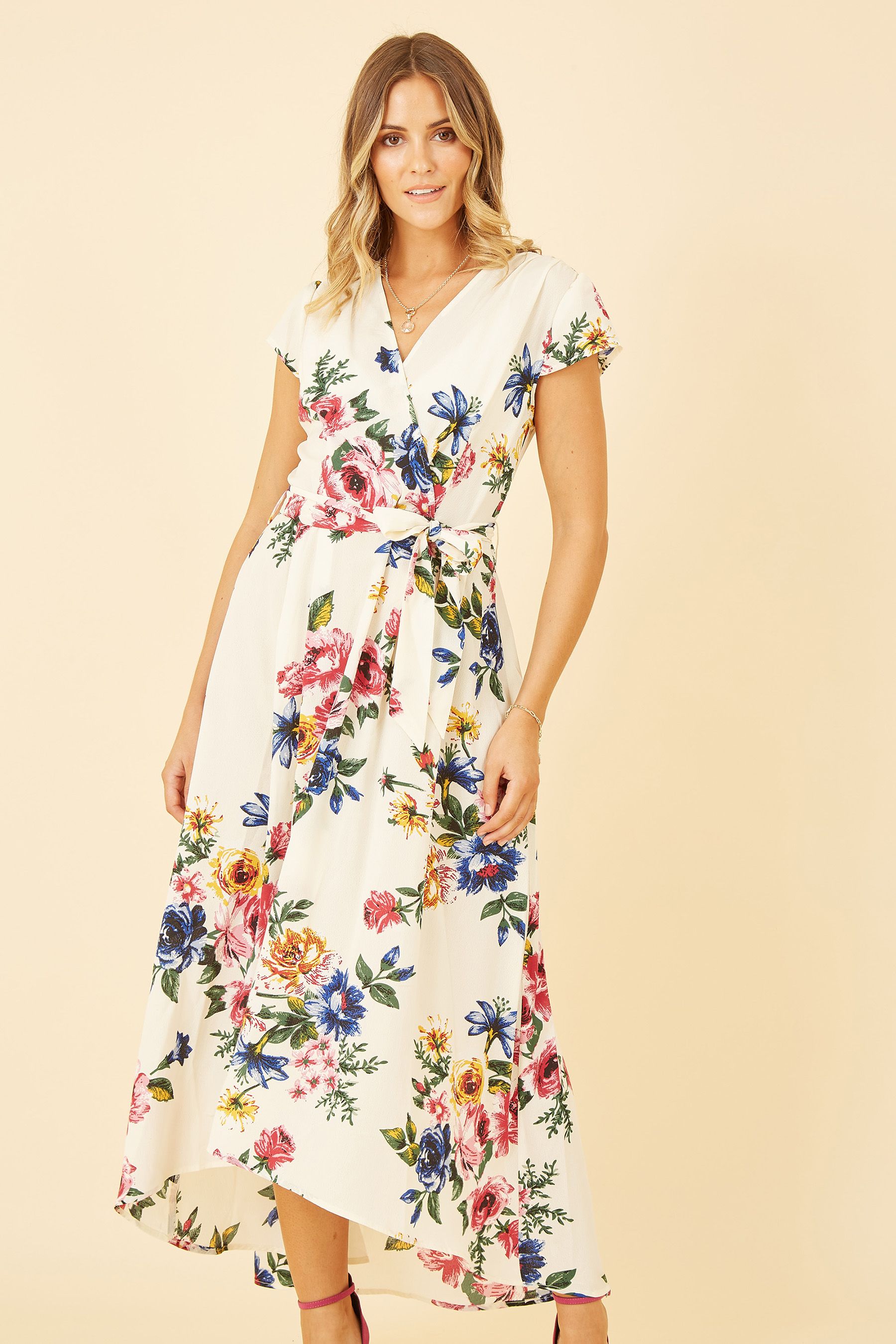 Mela Cream Wrap Dip Hem Dress