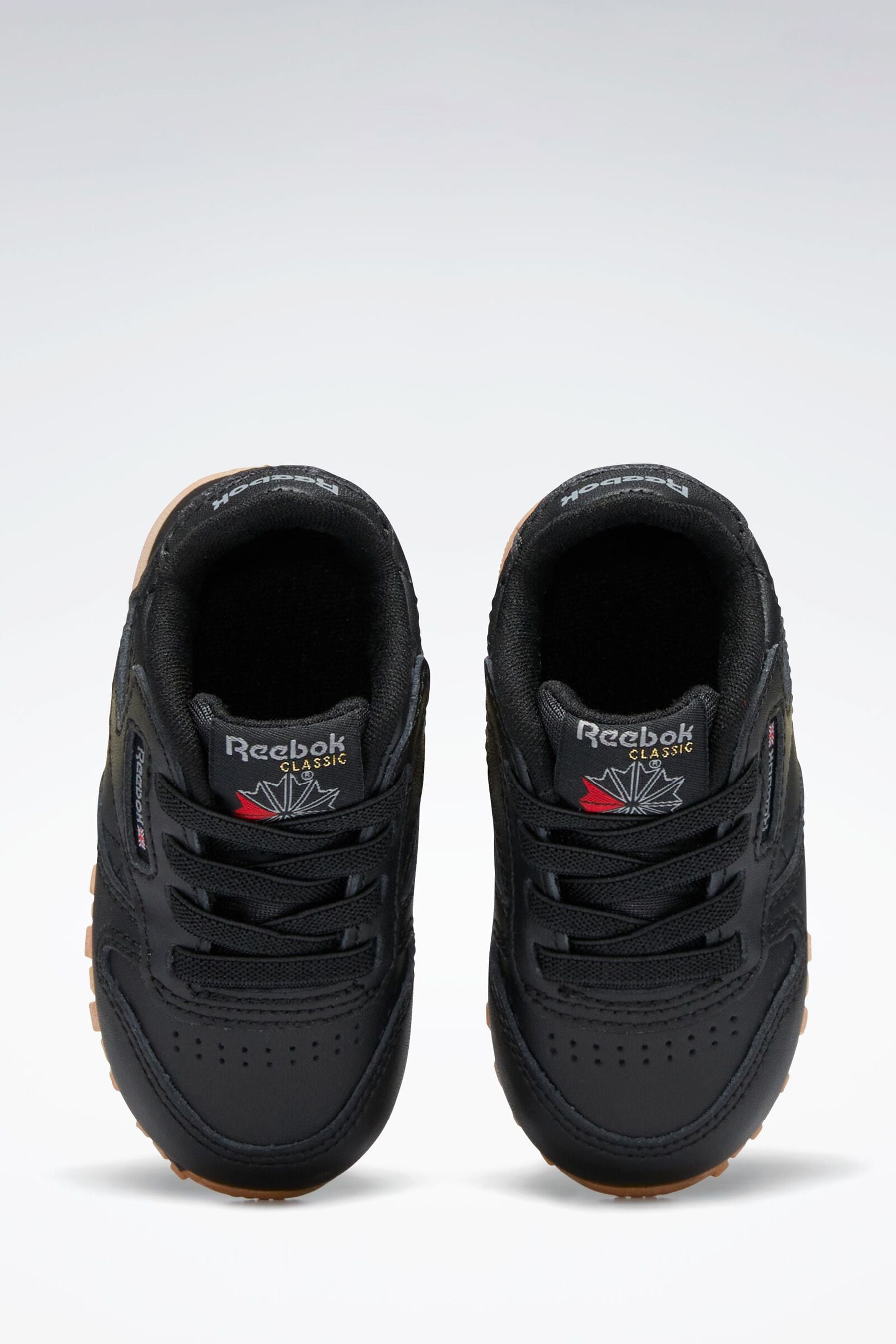 Reebok black shoes for women online