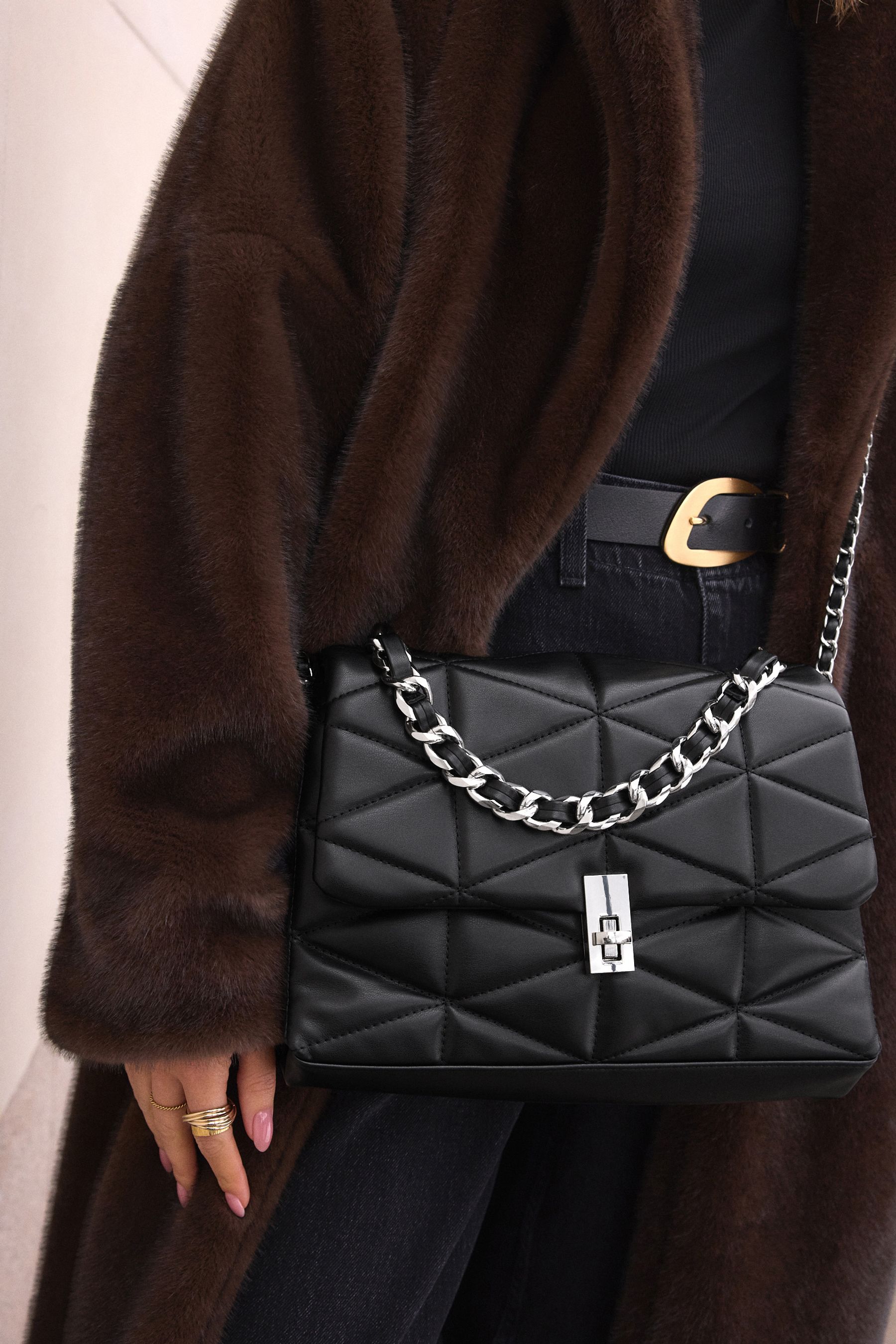 Black quilted cross body bag outlet